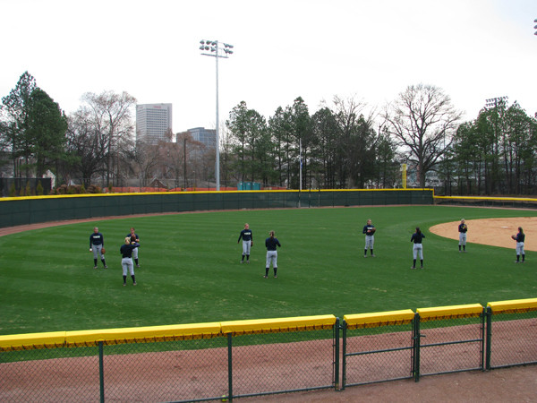 Softball team practices in its new stadium for the first time.