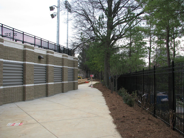 Softball team practices in its new stadium for the first time.