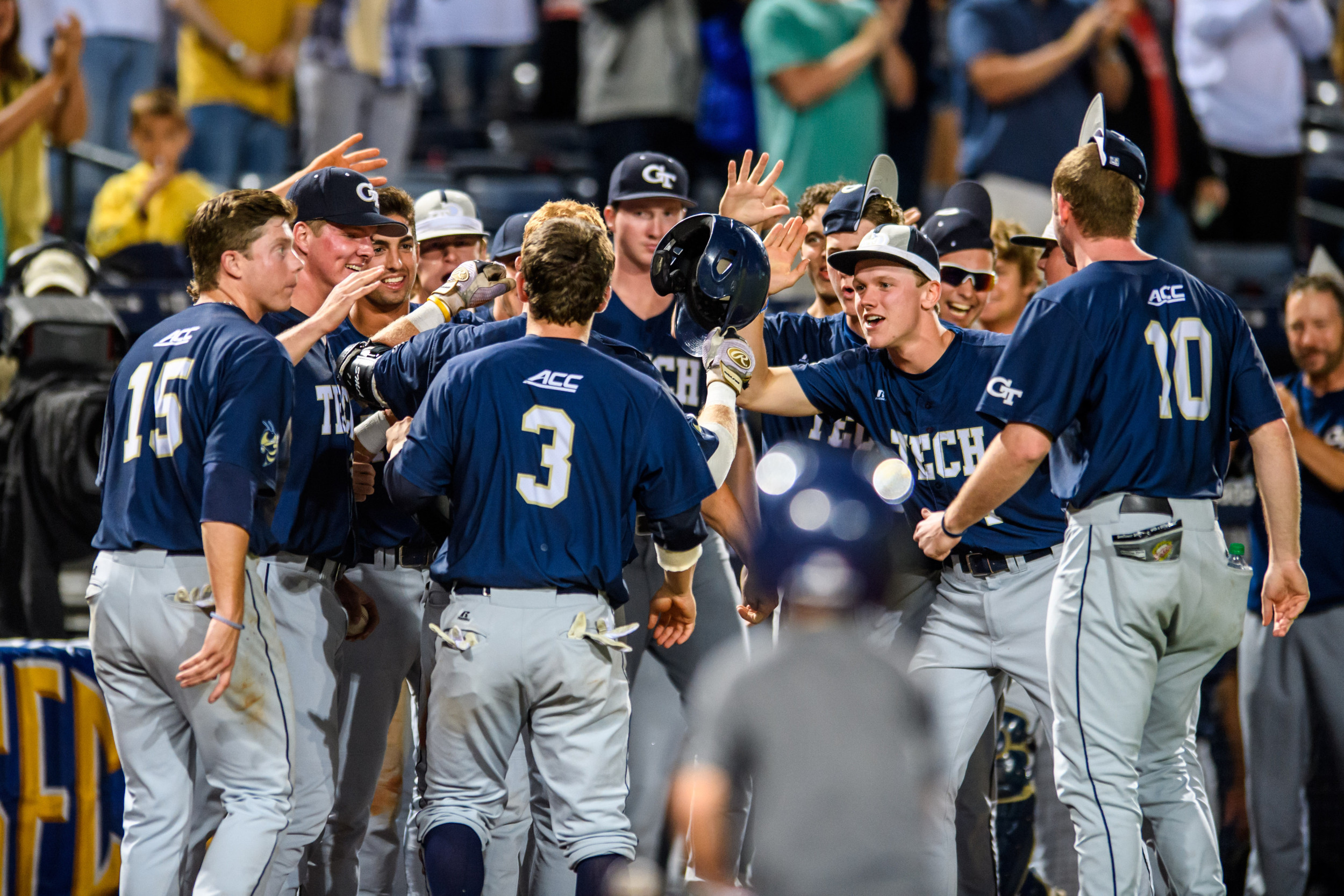 The team celebrates the home run