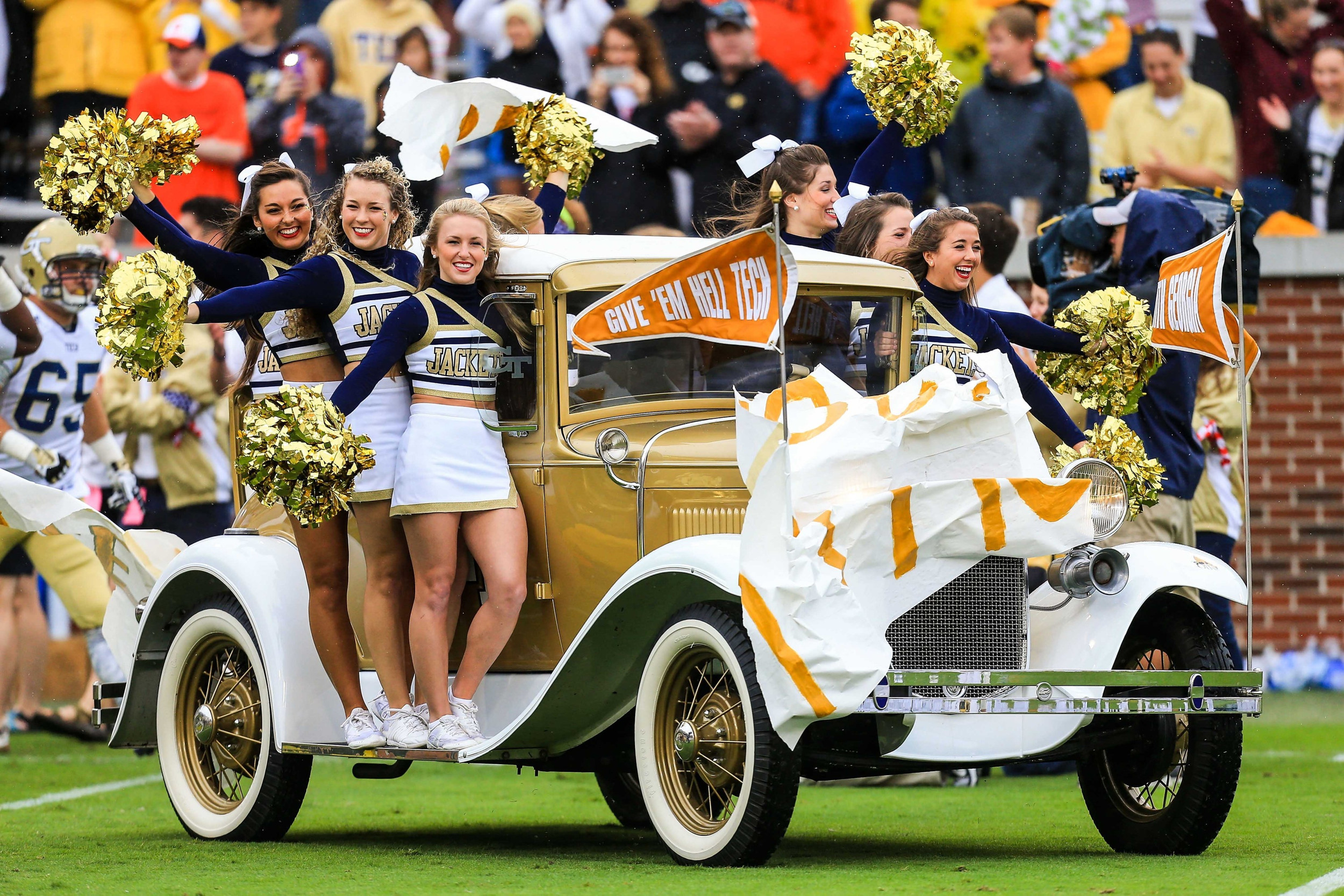 The Georgia Tech Yellow Jackets cheerleaders on the Ramblin Wreck comes on the field before the game. Mandatory Credit: Daniel Shirey-USA TODAY Sports