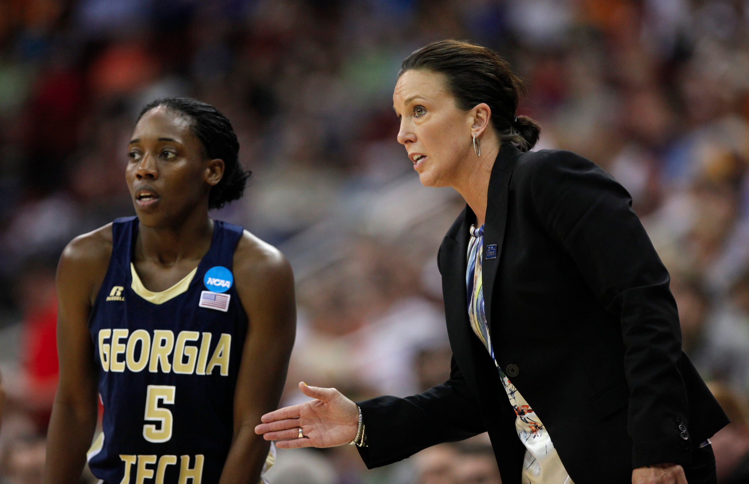 Georgia Tech's coach MaChelle Joseph, right, instructs Metra Walthour (5) in the first half. (AP Photo/Nati Harnik)