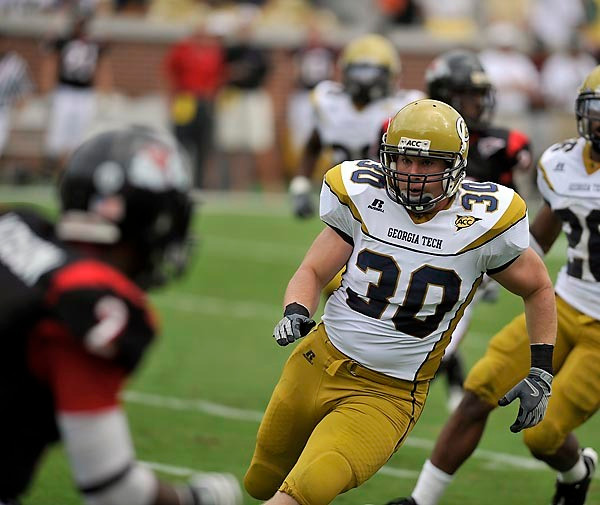 James Liipfert (30) tracks down the Gardner-Webb kick returner. (Photo by LensEffects)