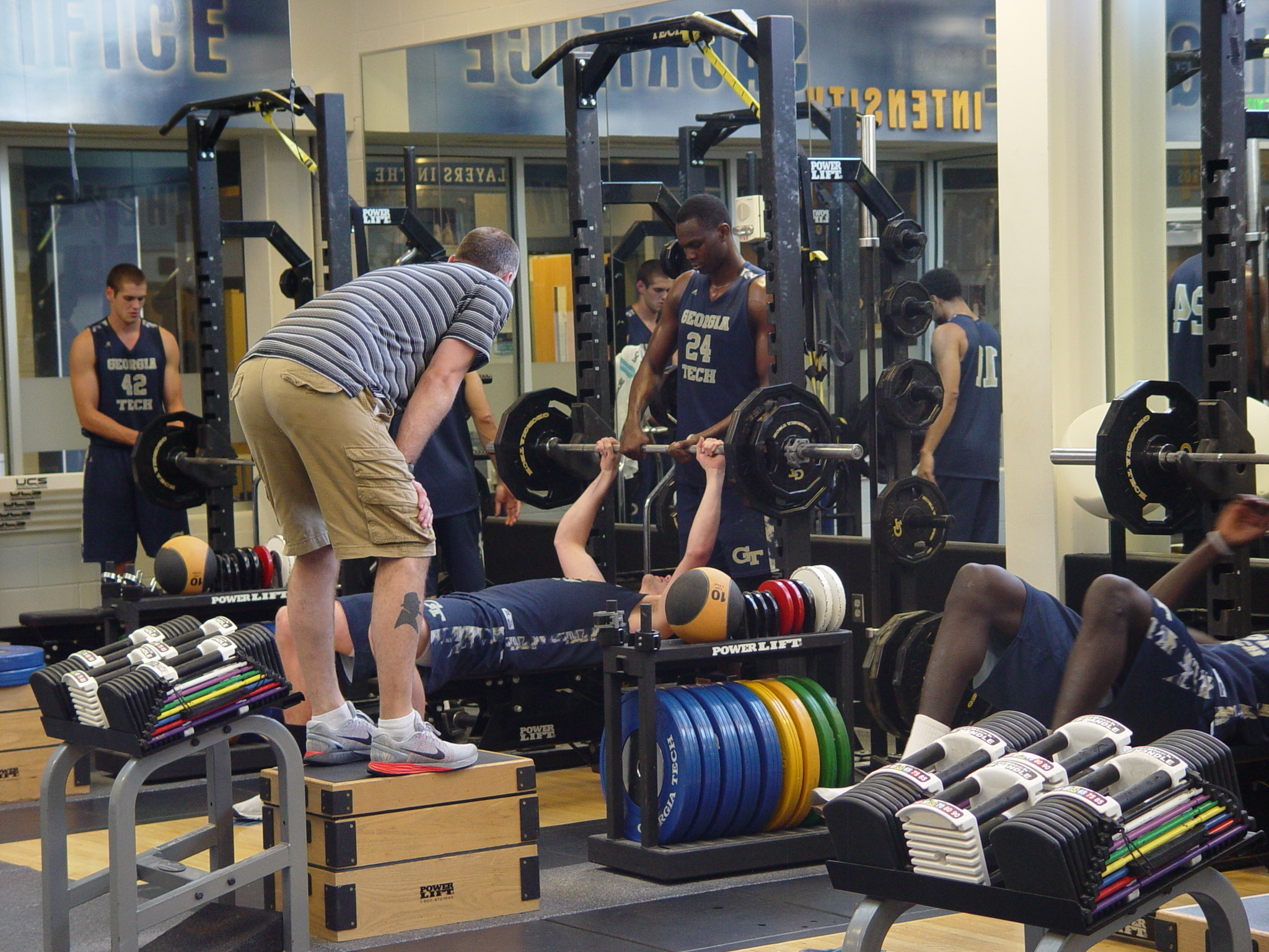 Player development coach Dan Taylor takes the Georgia Tech men's basketball team through a workout on June 16, 2016 in the Zelnak Center weight room.