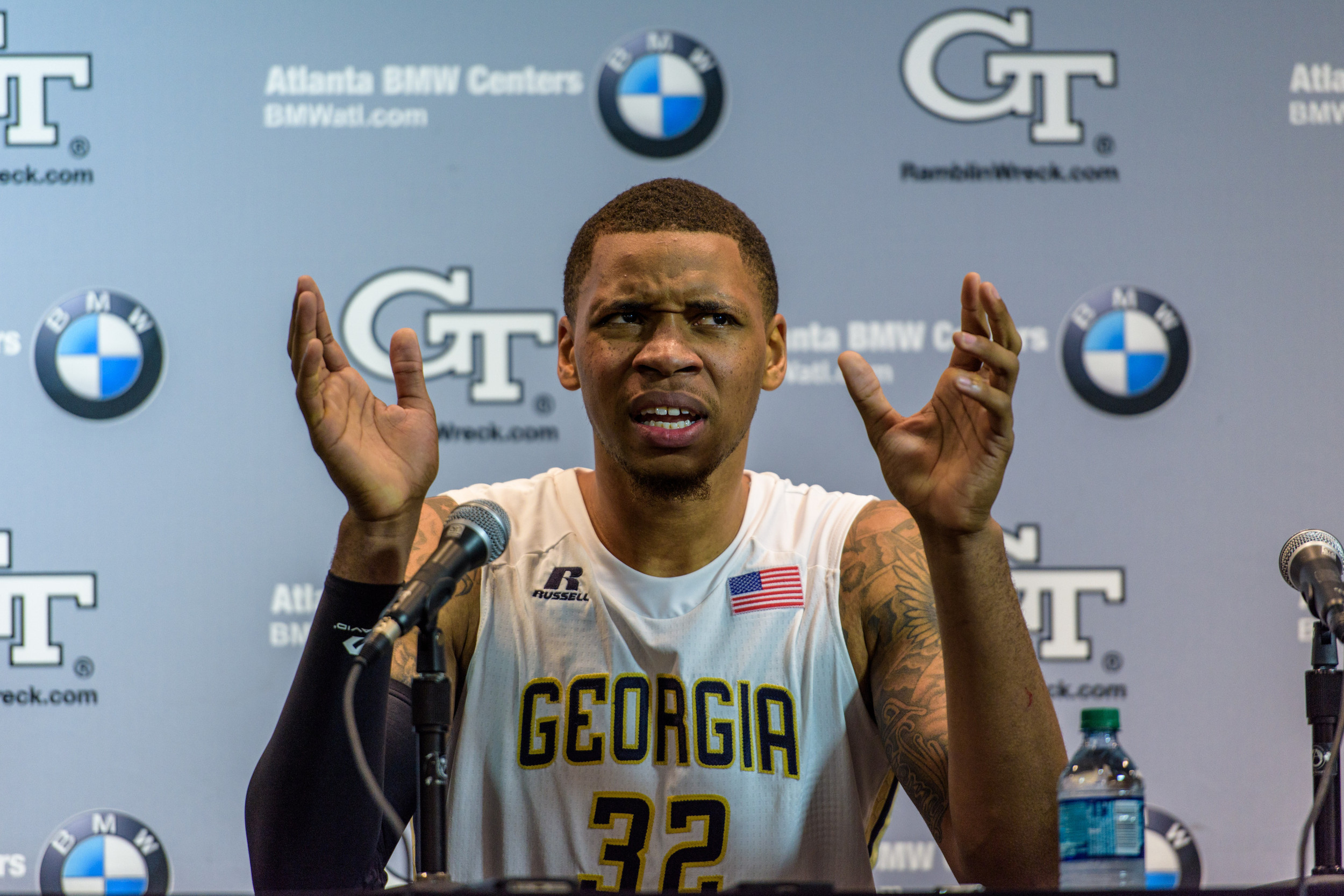 Nick Jacobs (32) talks to the media in the postgame press conference