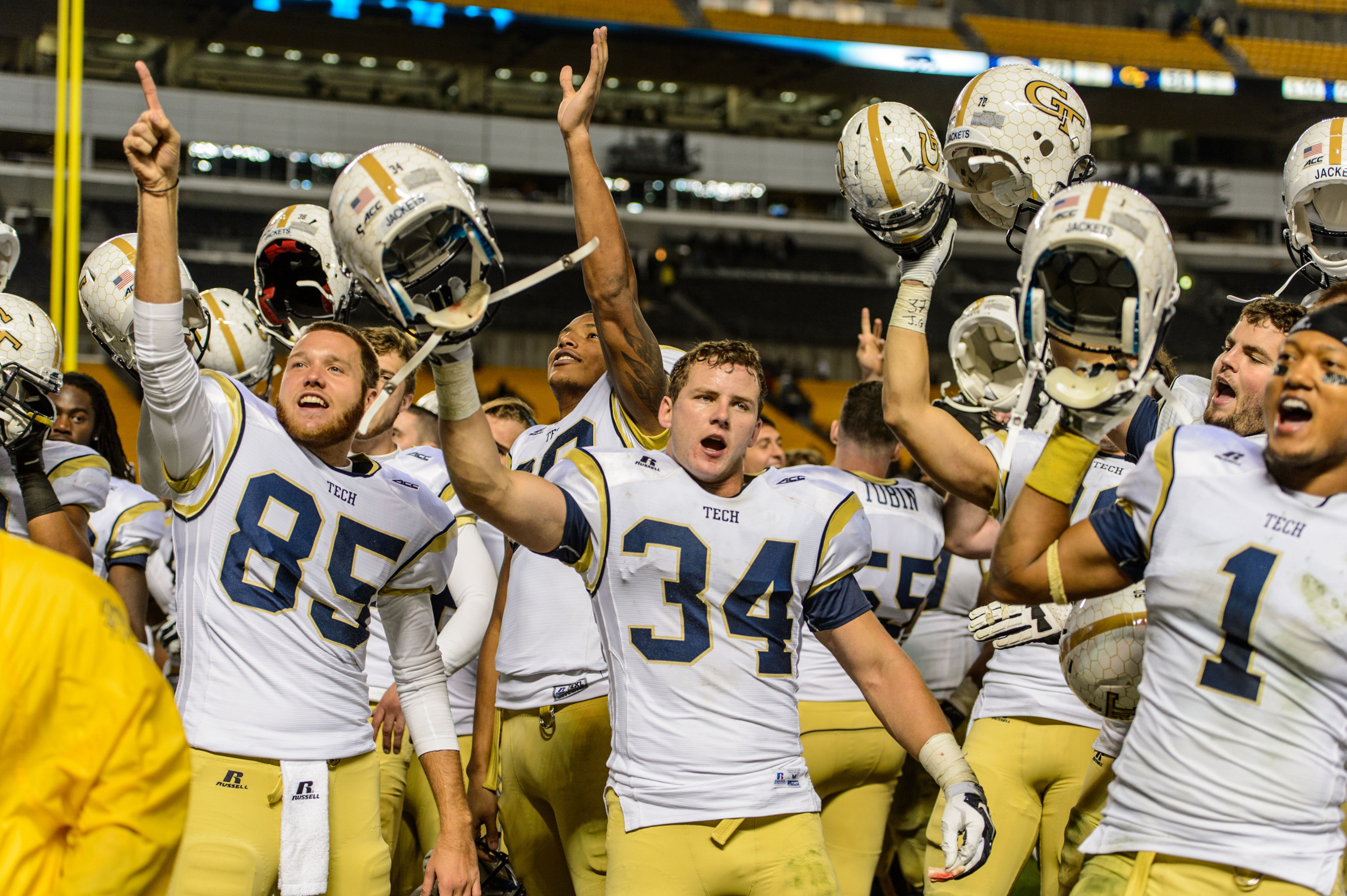 The team sings the Ramblin' Wreck with the fans after the win