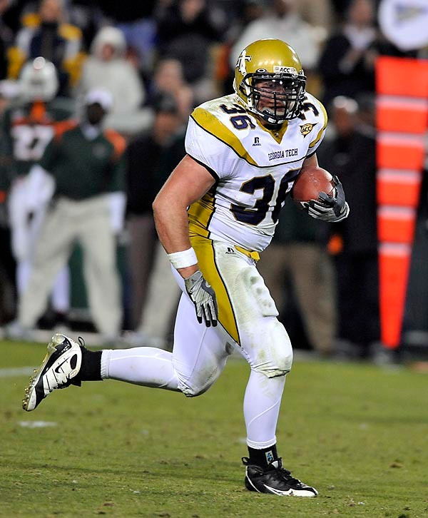 Lucas Cox (36) scores a touchdown on his longest run of the day, a 32 yard effort. (Photo by LensEffects)