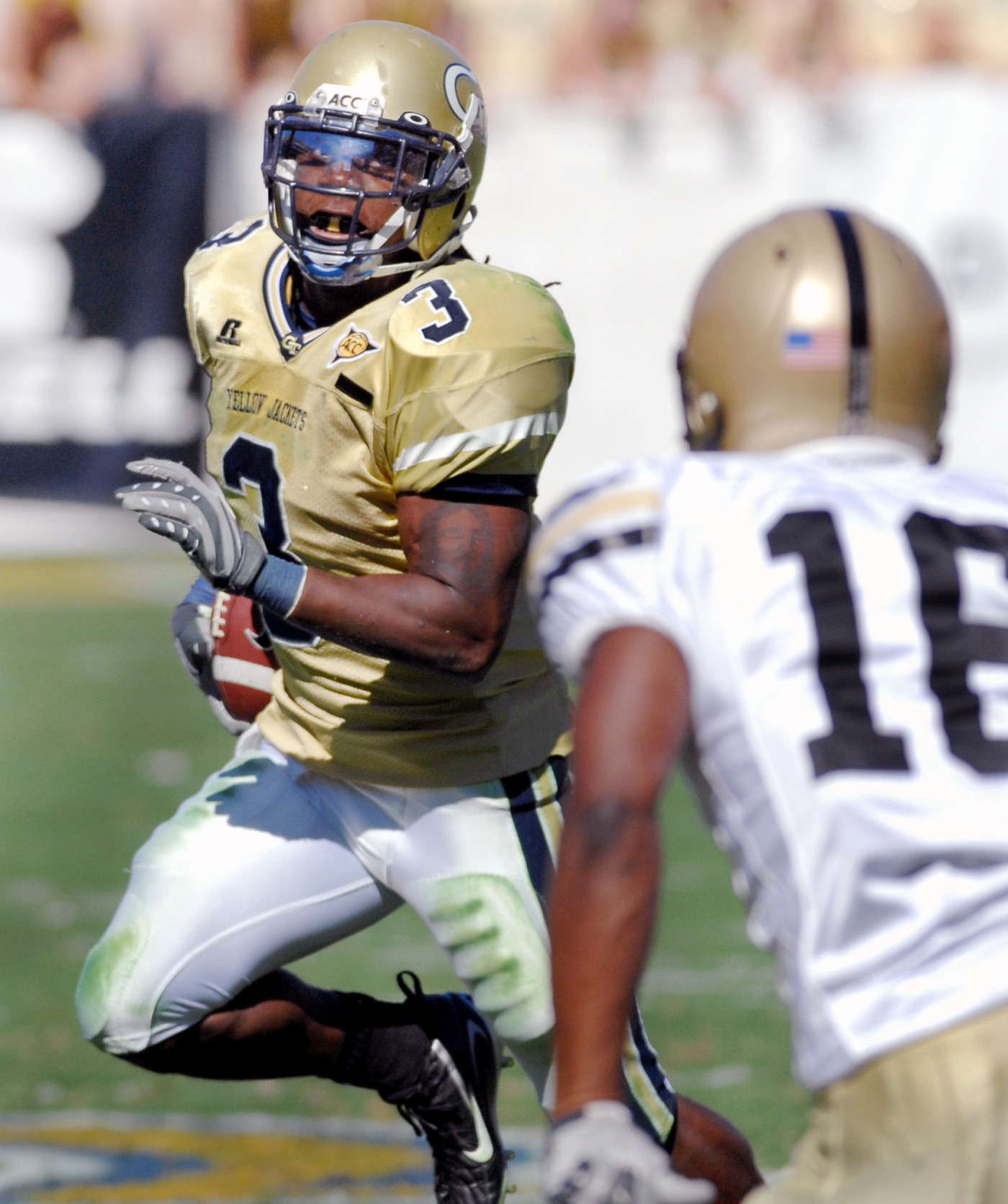 Rashaun Grant drives against Army defensive back Jordan Trimble during the third quarter in Atlanta. (AP Photo/Gregory Smith)