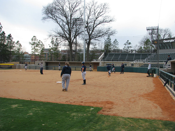 Softball team practices in its new stadium for the first time.