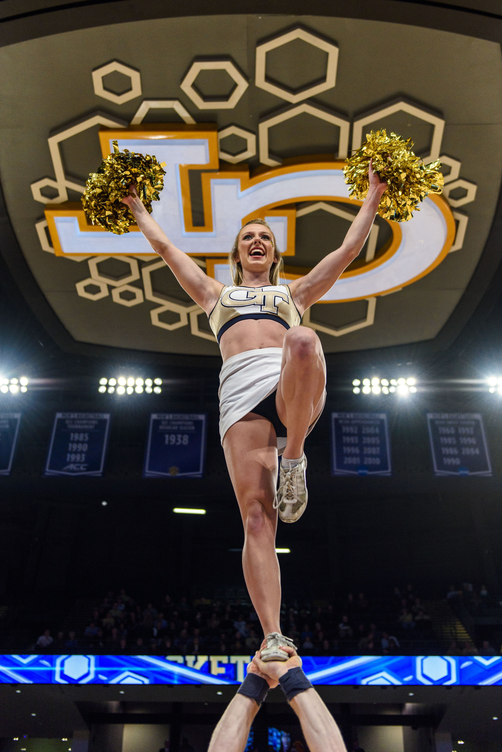 Georgia Tech Cheerleaders perform for the crowd during a timeout.
