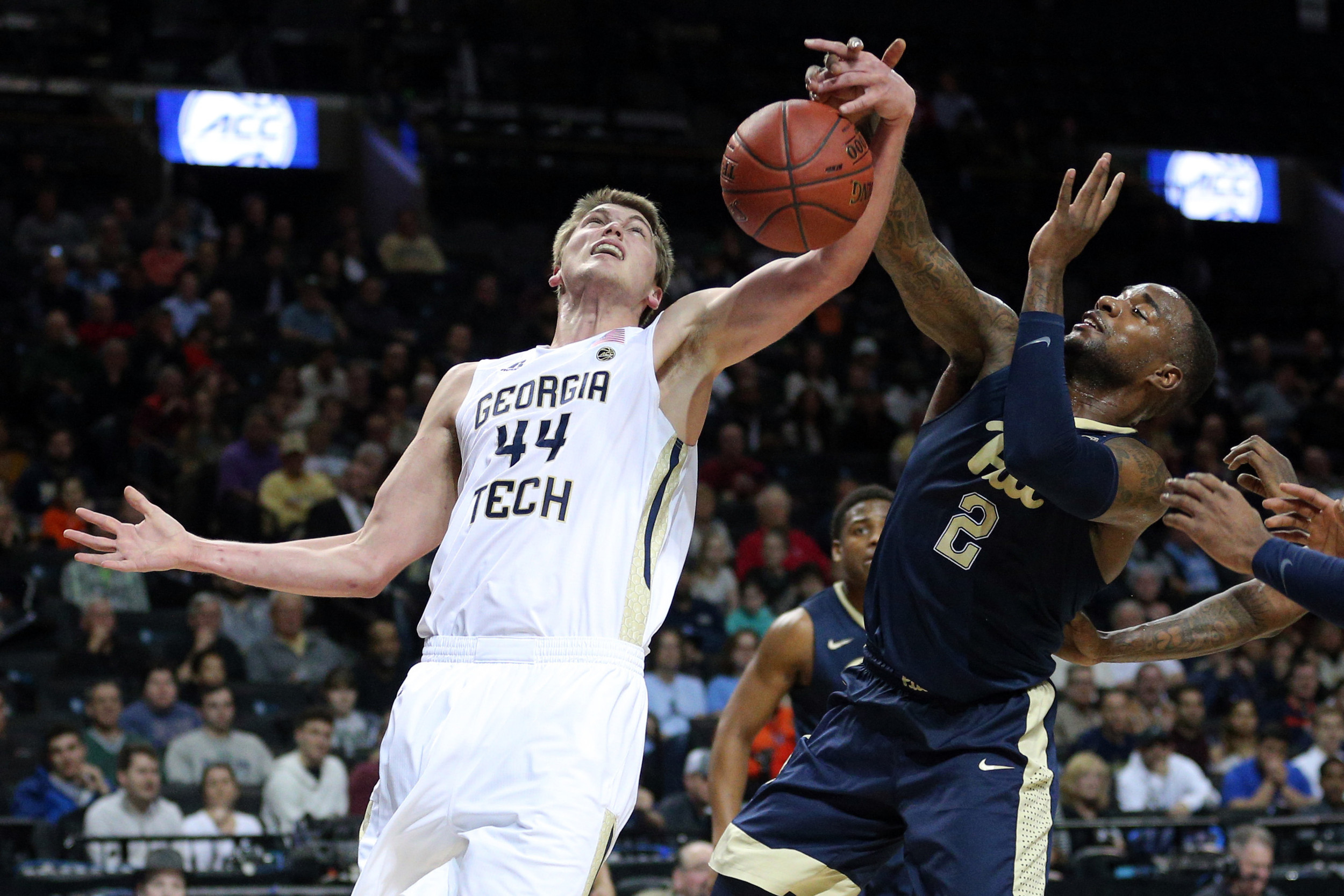 Center Ben Lammers and Pittsburgh Panthers forward Michael Young fight for a rebound during the first half of an ACC Conference Tournament game at Barclays Center. Credit: Brad Penner-USA TODAY Sports