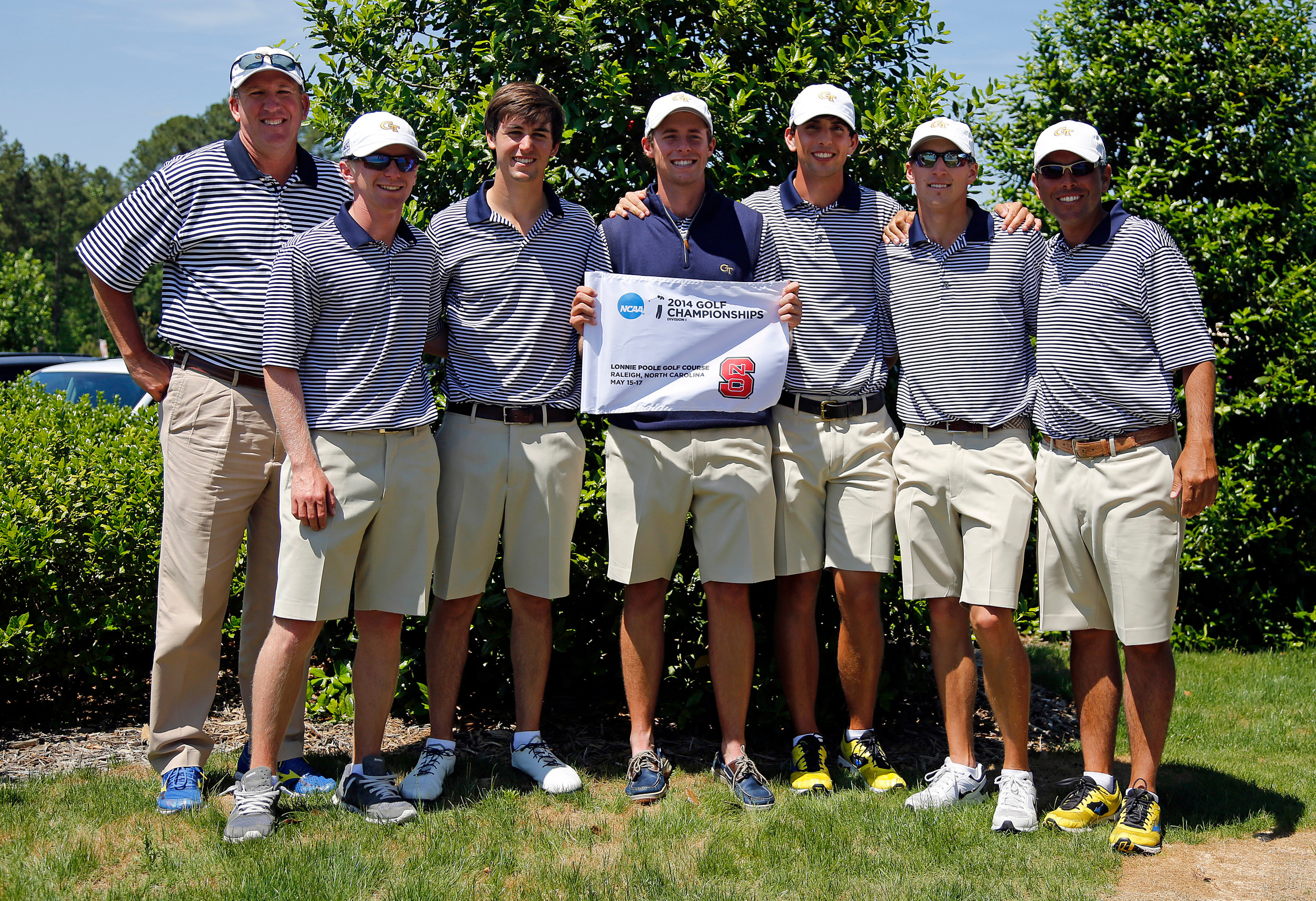Georgia Tech Yellow Jackets pose with their championship flag/trophy Saturday at the NCAA Raleigh Regional