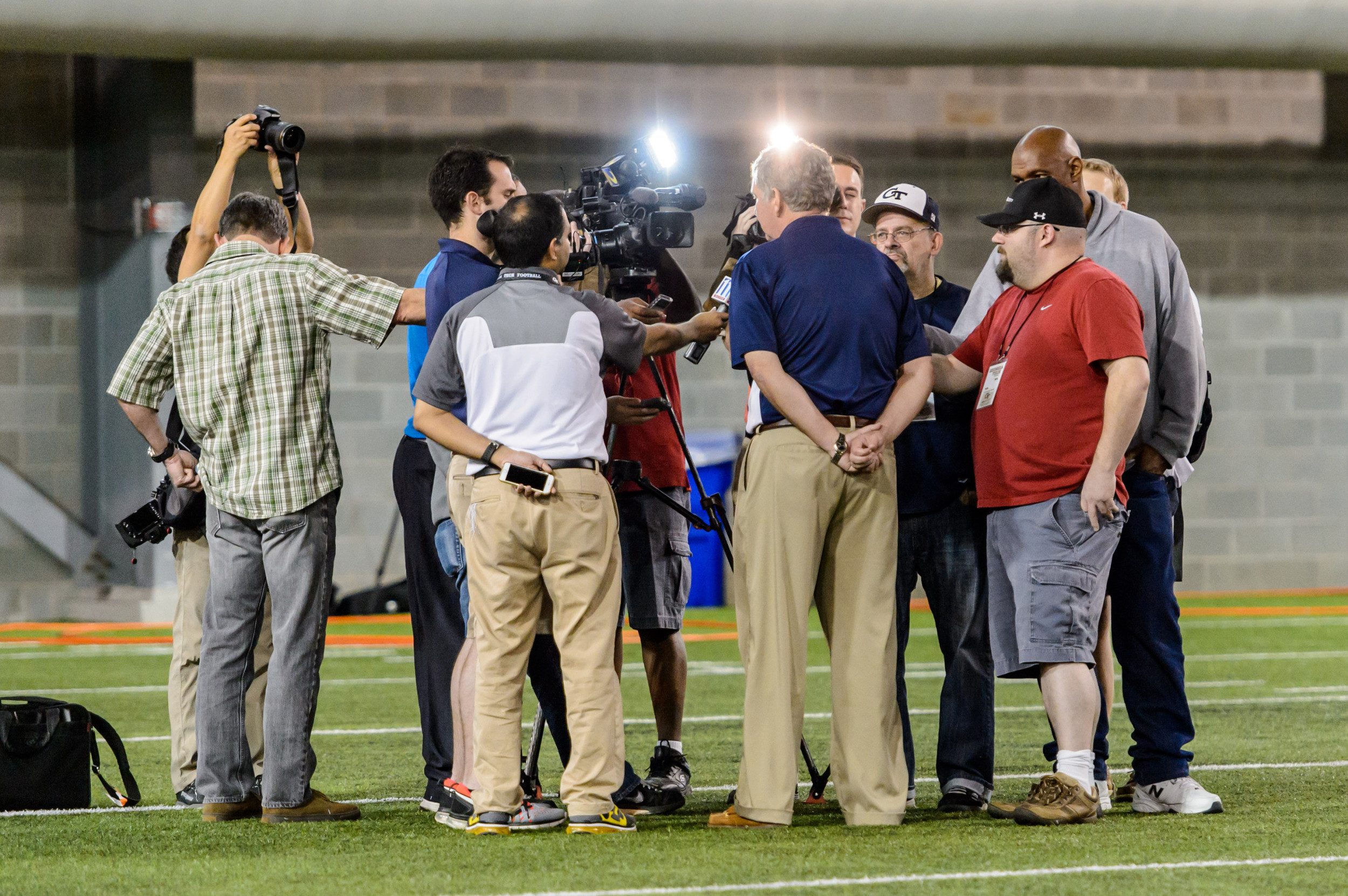 The media interviews Coach Johnson