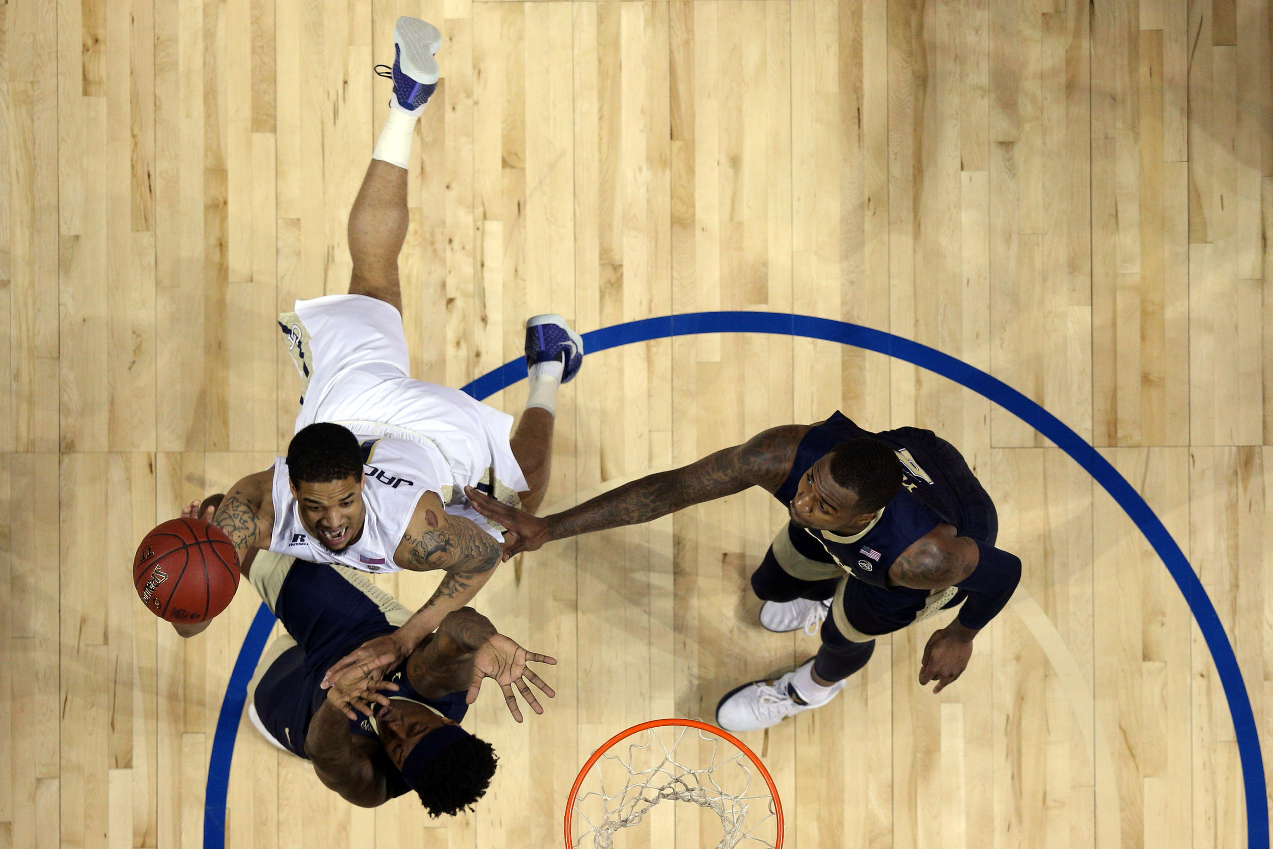 Guard Tadric Jackson drives against Pittsburgh Panthers forwards Jamel Artis and Michael Young during the first half of an ACC Conference Tournament game at Barclays Center. Credit: Brad Penner-USA TODAY Sports