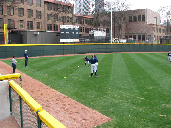 Softball team practices in its new stadium for the first time.