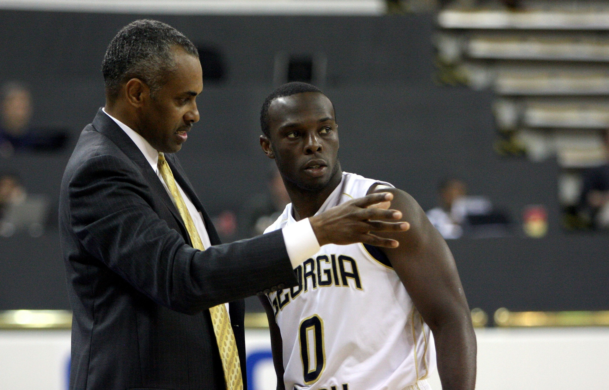 Head Coach Paul Hewitt with Mfon Udofia