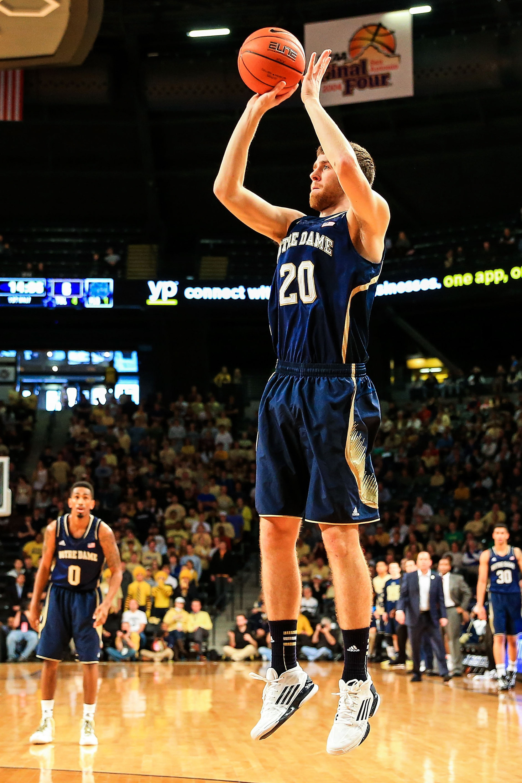 Jan 11, 2014; Atlanta, GA, USA; Notre Dame Fighting Irish forward Austin Burgett (20) shoots a basket in the first half against the Georgia Tech Yellow Jackets at Hank McCamish Pavilion. Mandatory Credit: Daniel Shirey-USA TODAY Sports