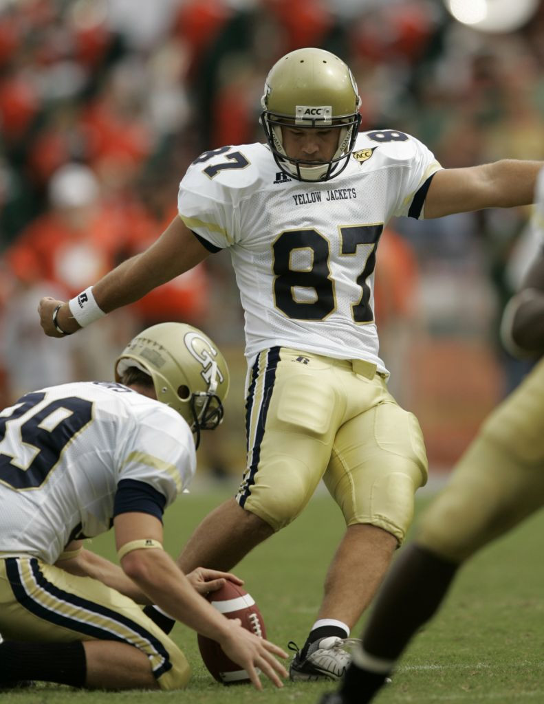 Georgia Tech kicker Travis Bell hits a 39-yard field goal as Durant Brooks holds the ball during the fourth quarter of a football game against Miami, Saturday, Oct. 13, 2007 at the Orange Bowl in Miami. The kick was the eventual game-winner for Georgia Tech, which became the fourth team since 1978 to beat Miami in three consecutive seasons, joining Notre Dame, Virginia Tech and Florida State.The Yellow Jackets won 17-14.