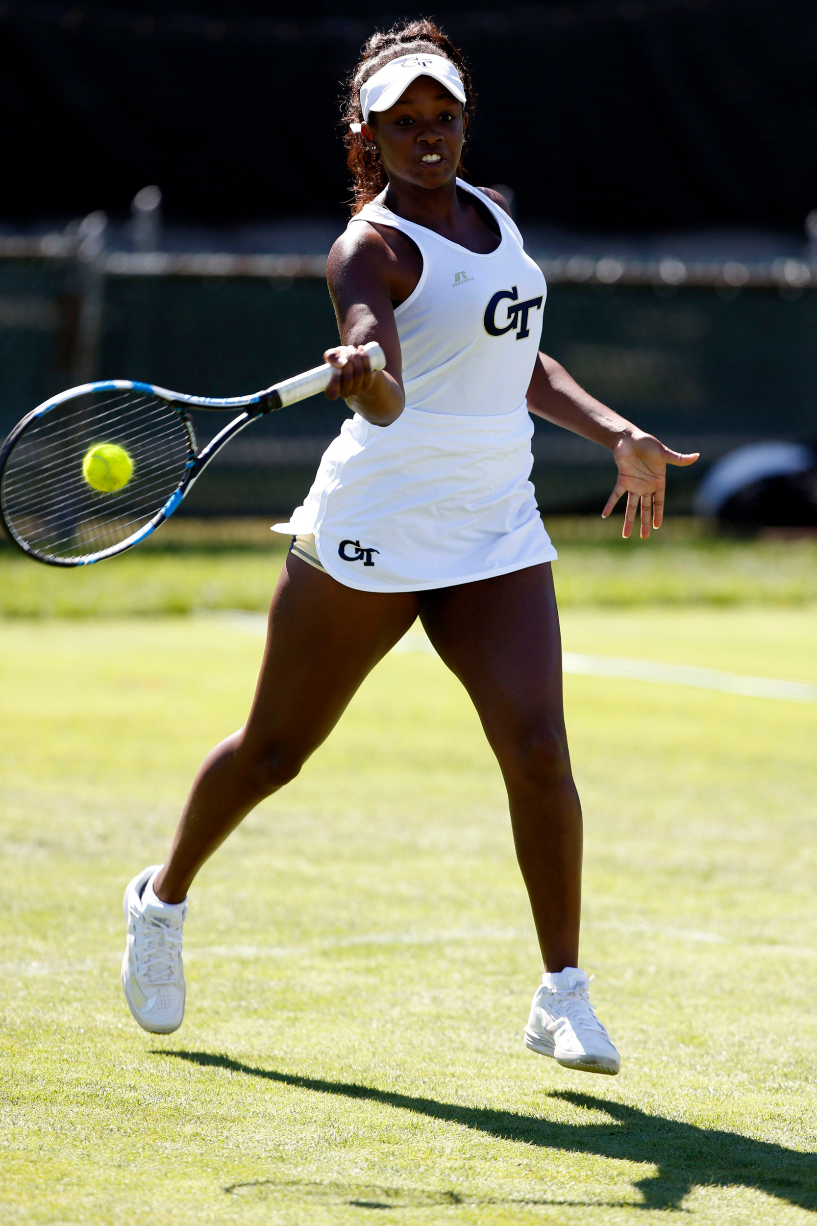 Kenya Jones makes a return during a match at the Hall of Fame Tennis Club. Credit: Greg M. Cooper-USA TODAY Sports