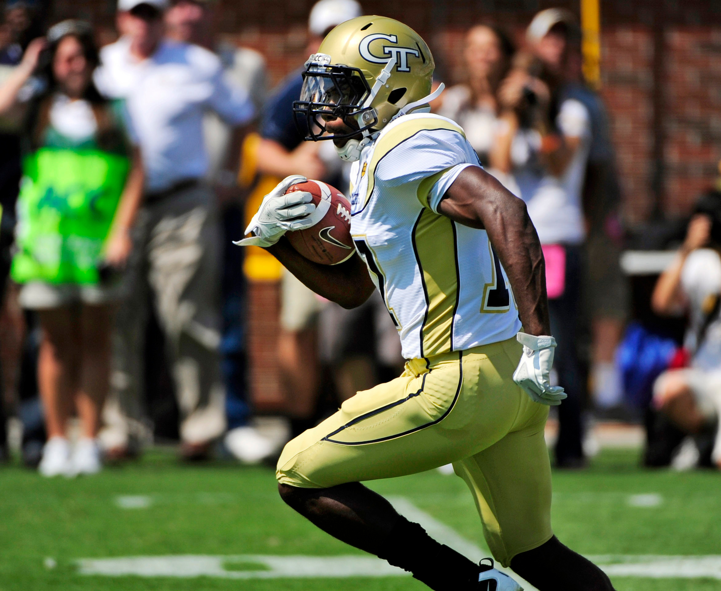 Georgia Tech running back Orwin Smith (17) runs for a 95-yard touchdown during the first half of an NCAA college football game against Kansas at Bobby Dodd Stadium in Atlanta on Saturday, Sept. 17, 2011. (AP Photo/David Tulis)
