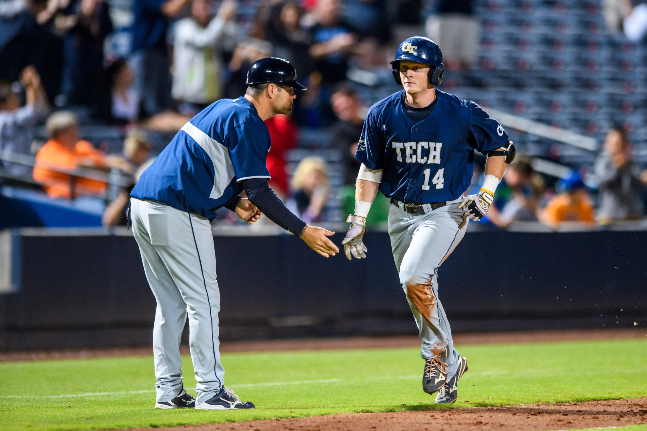 Matt Gonzalez (14), Assistant Coach Bryan Prince (18)