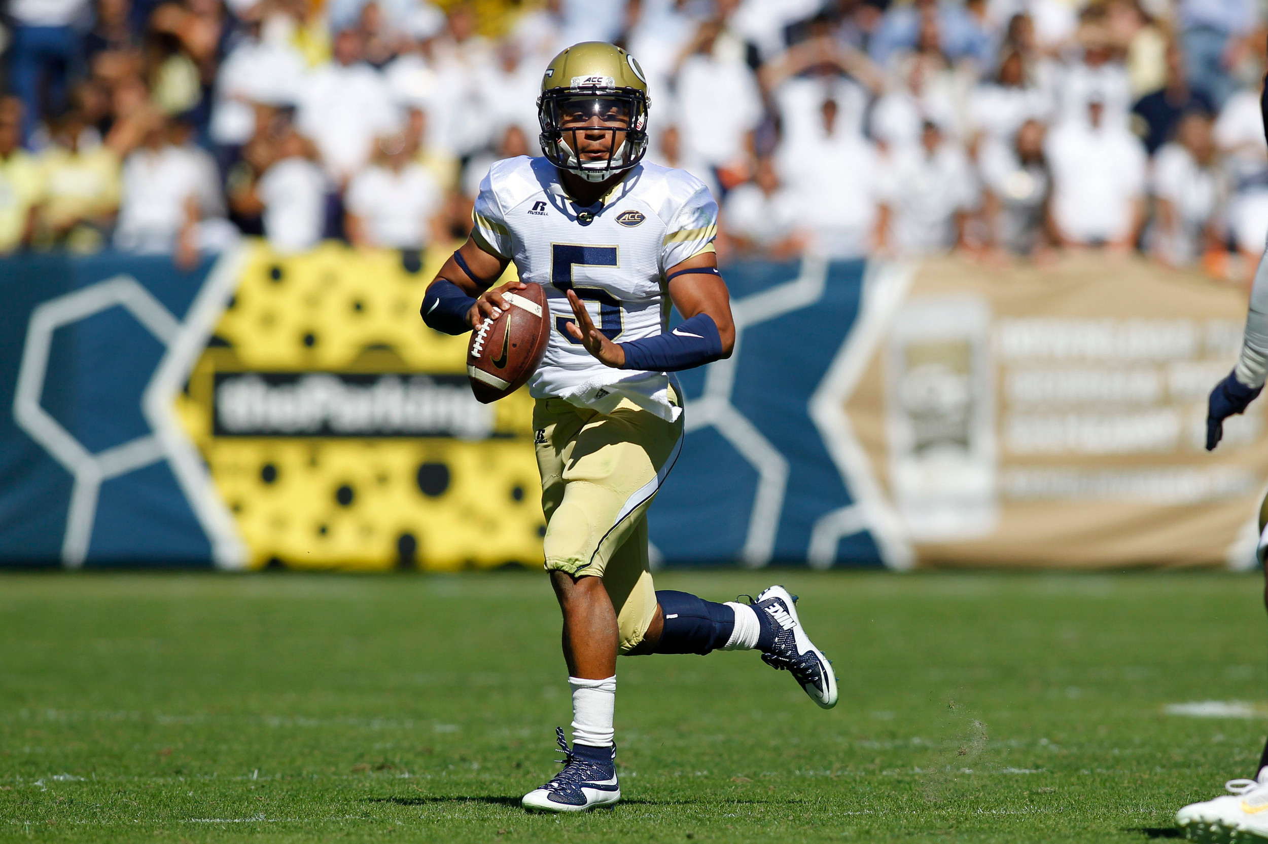 Yellow Jackets quarterback Justin Thomas (5) throws a pass against the Pittsburgh Panthers in the second quarter at Bobby Dodd Stadium. Brett Davis-USA TODAY Sports