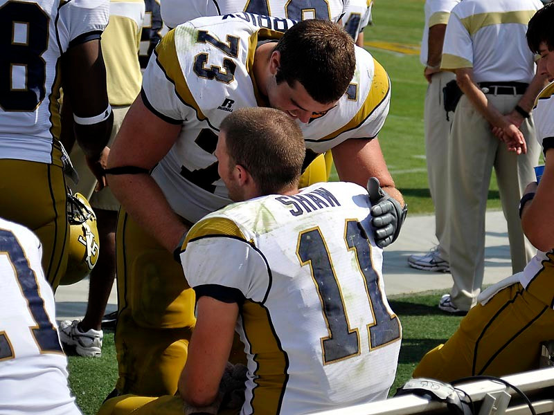 Jaybo Shaw (11) is congradulated by Jeff Lentz (73) after Shaw completed a 88 yard pass to Demaryius Thomas against Duke.