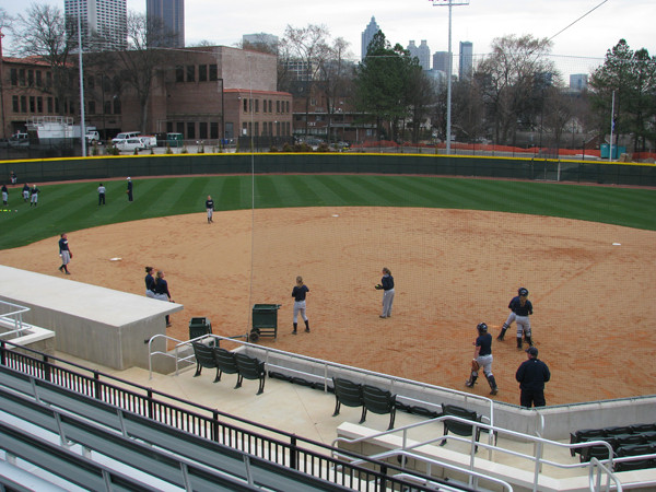 Softball team practices in its new stadium for the first time.