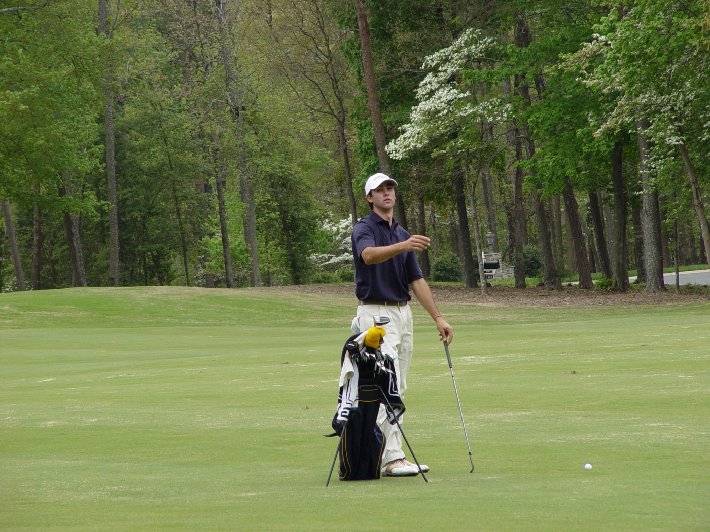 Cameron Tringale checks the wind prior to hitting his approach shot at No. 12 during round two of the ACC Golf Championship, April 19, 2008.