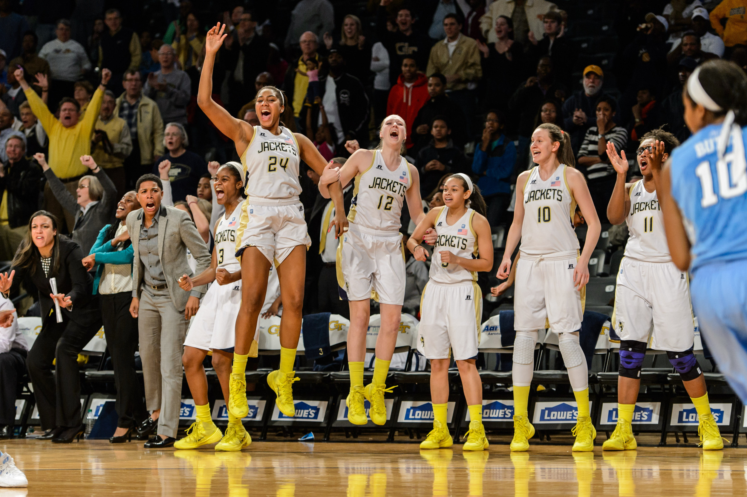 The team celebrates Ty Marshall's 32nd point of the game.
