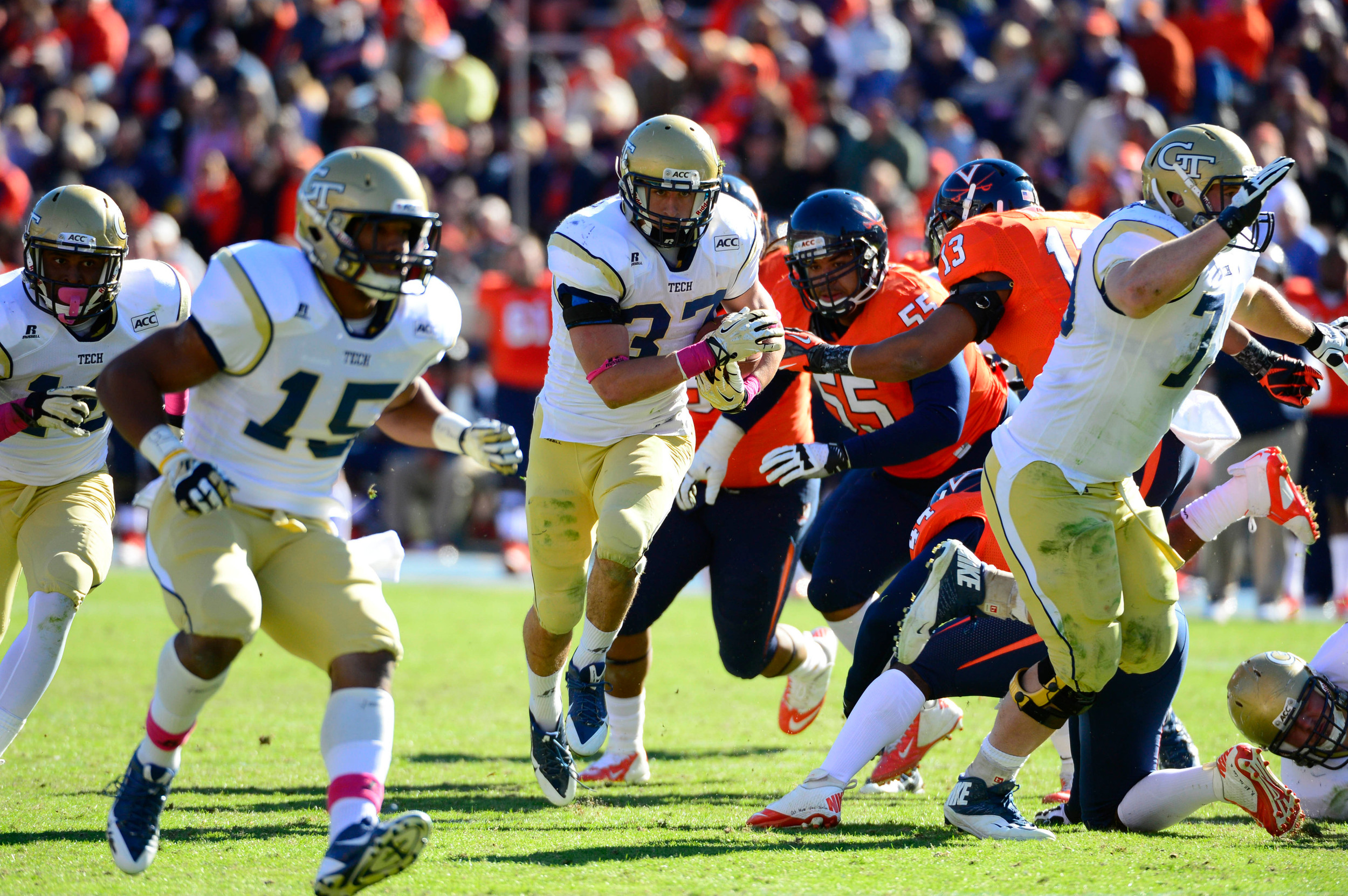 Zach Laskey (37) runs as wide receiver DeAndre Smelter (15) offensive linesman Chase Roberts (79) block in the third quarter. Mandatory Credit: Bob Donnan-USA TODAY Sports