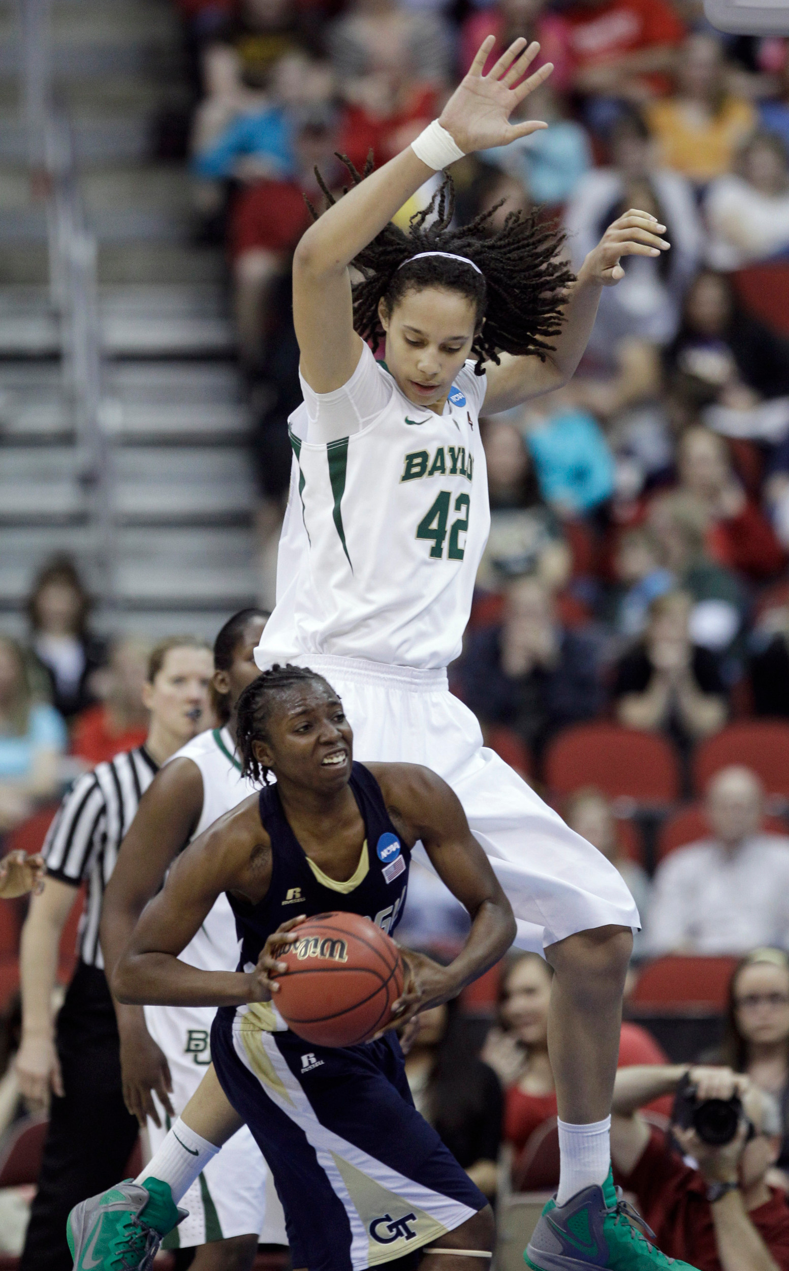 Georgia Tech guard Tyaunna Marshall looks to pass under Baylor center Brittney Griner (42) during the second half. (AP Photo/Charlie Neibergall)