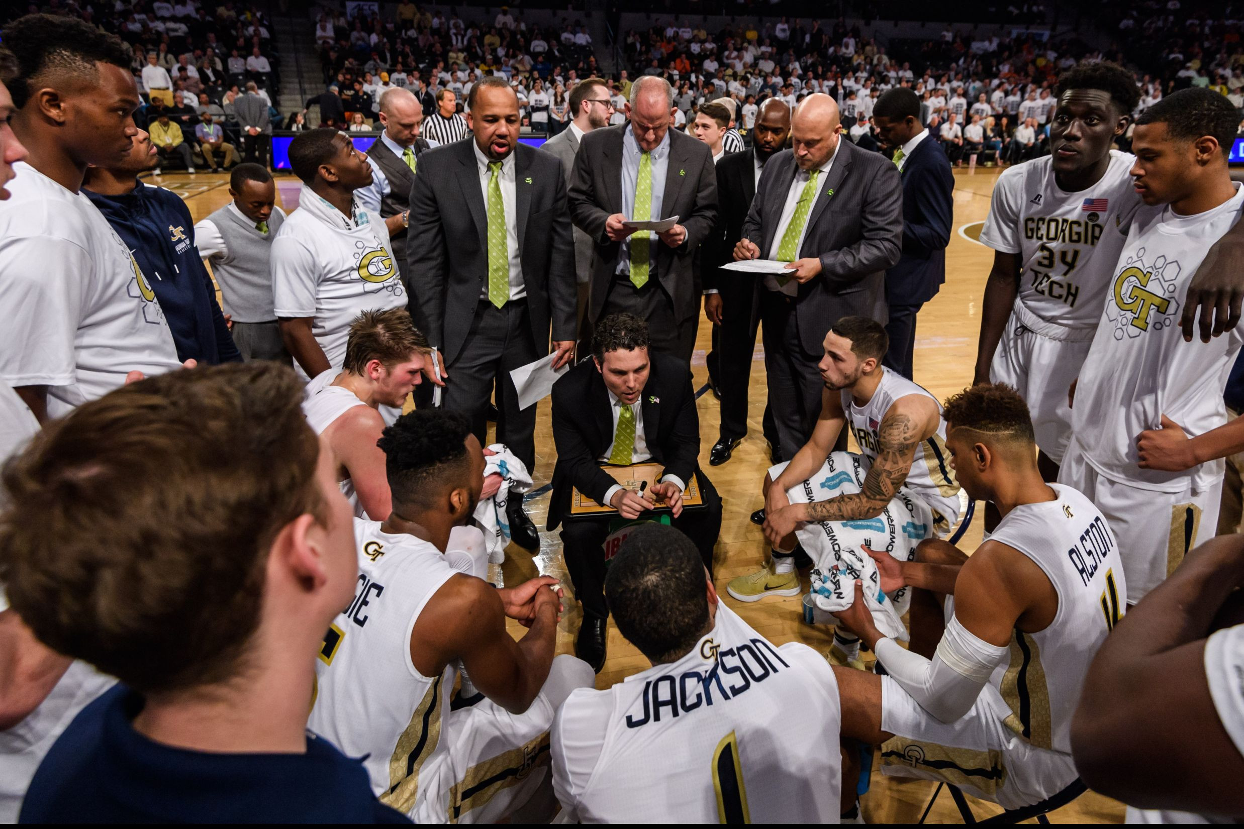 Coach Pastner talks to the team during a time out