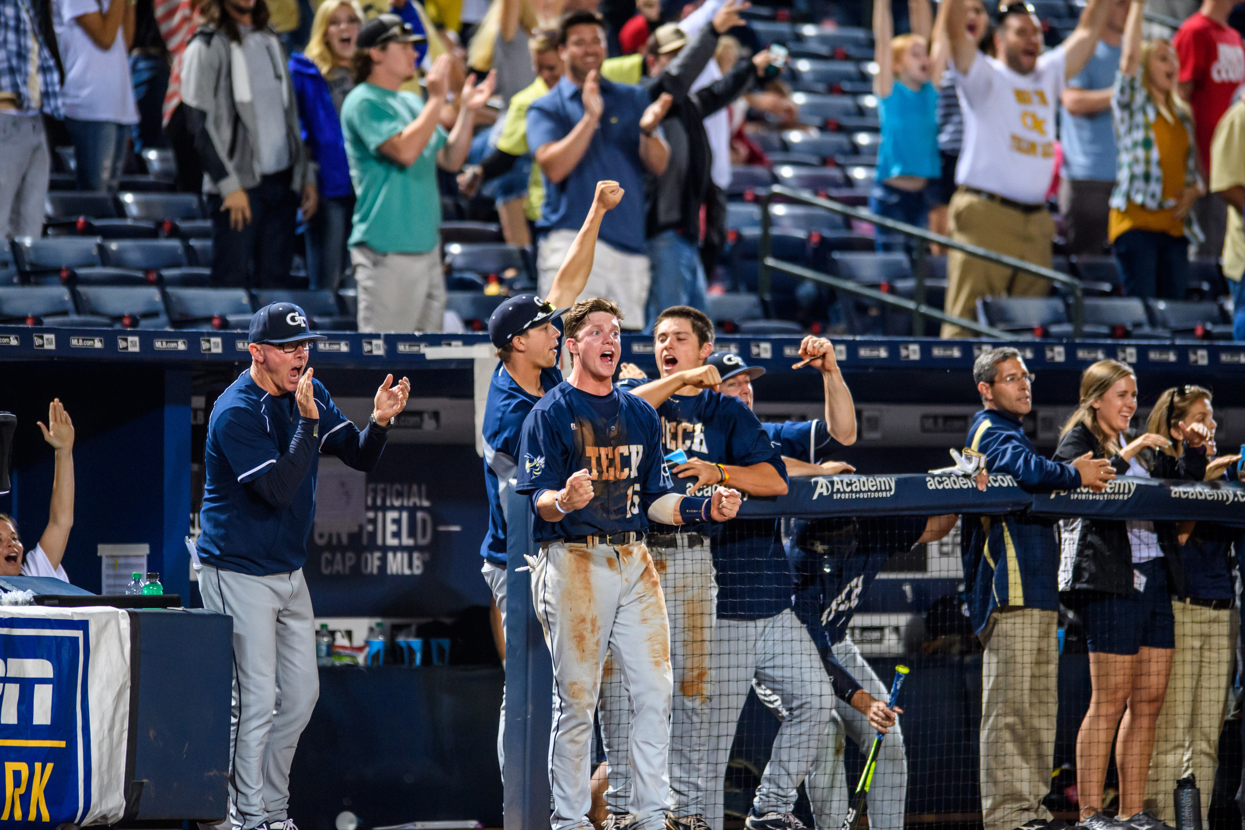The dugout celebrates the home run