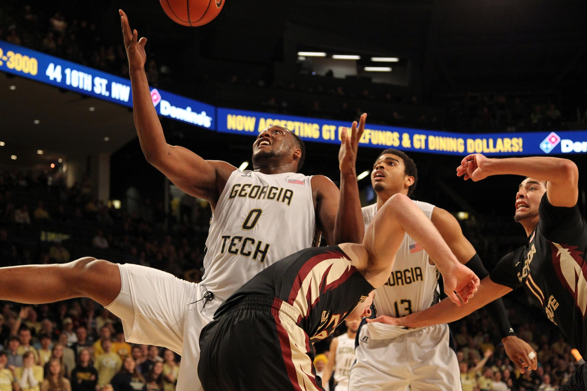 Feb 14, 2015; Atlanta, GA, USA; Georgia Tech Yellow Jackets forward Charles Mitchell (0) reaches for a rebound against the Florida State Seminoles in the second half at McCamish Pavilion. Florida State defeated Georgia Tech 57-53.