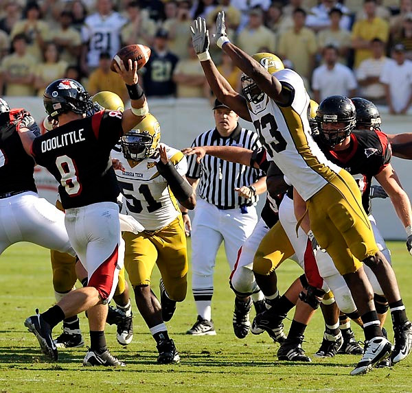 Michael Johnson (93) pressures the Gardner-Webb quarterback into a hurried throw. (Photo by LensEffects)