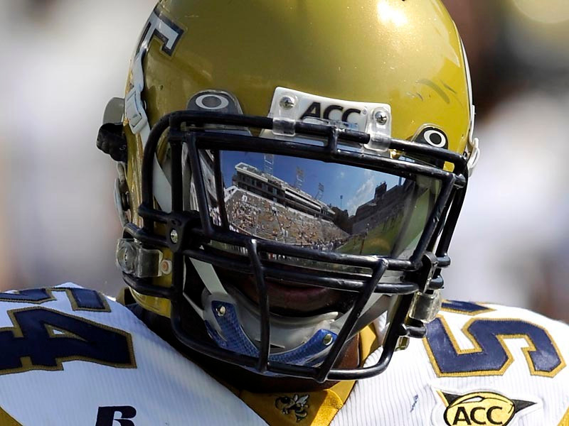 Sedric Griffin (54) in warm ups before the game against Duke.