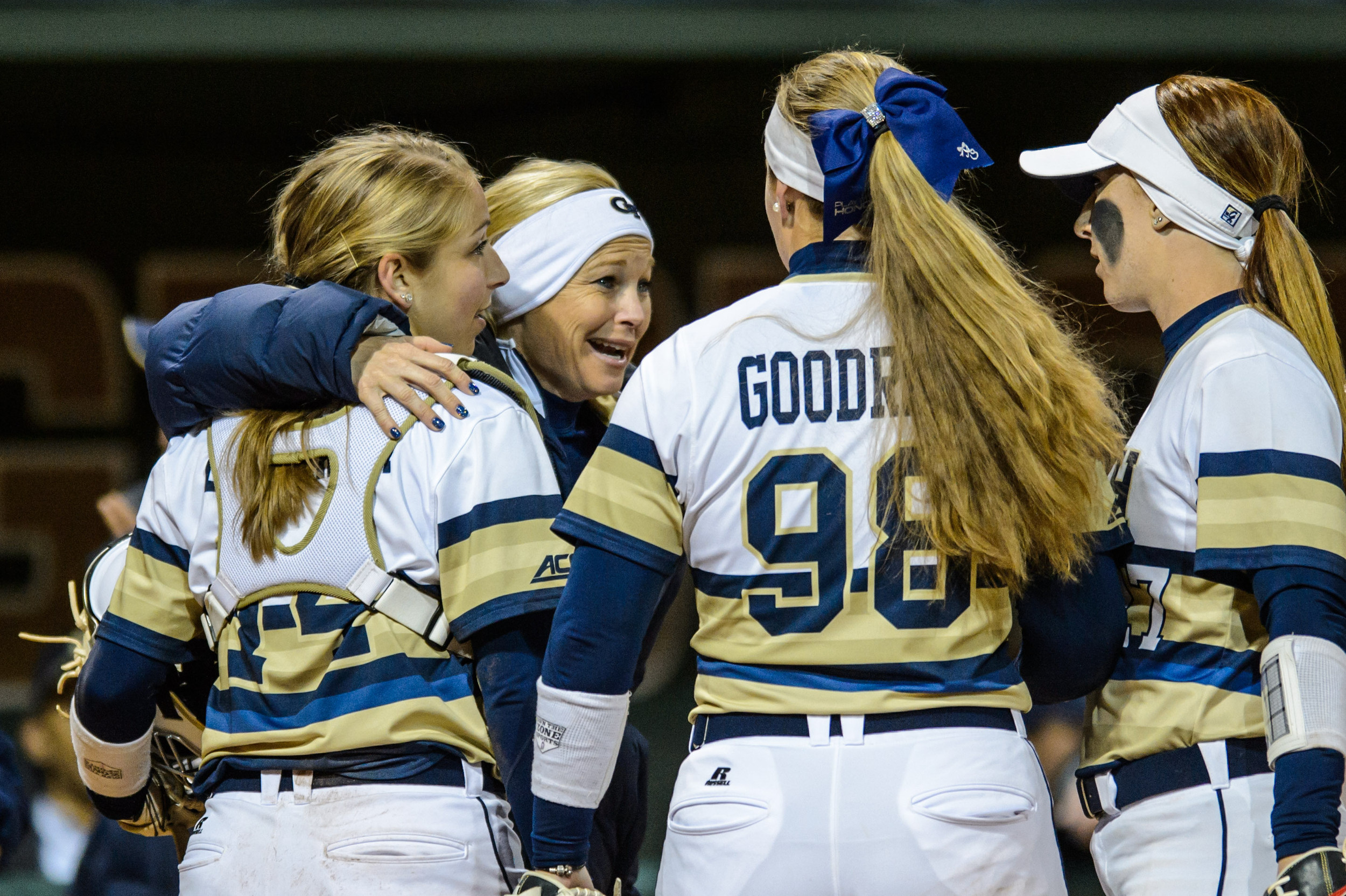 Kaylee Ellebracht (14), Jenna Goodrich (98), Coach Shelly Hoerner, Courtney Ziese (27)