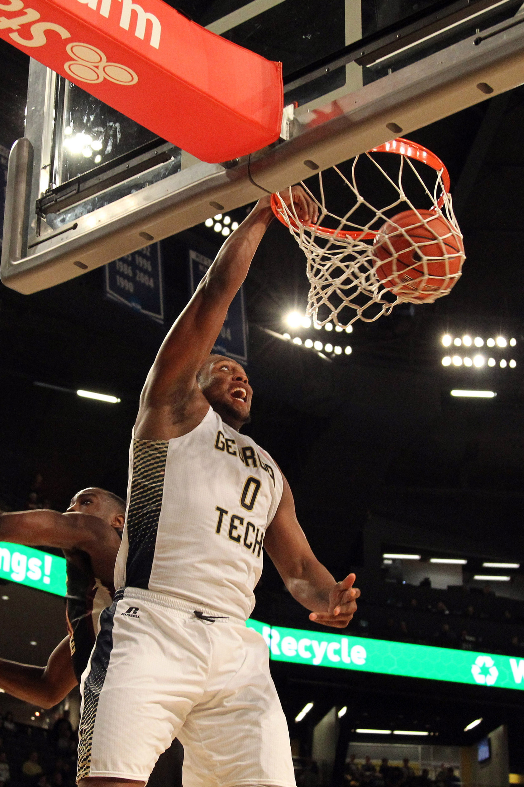 Feb 14, 2015; Atlanta, GA, USA; Georgia Tech Yellow Jackets forward Charles Mitchell (0) dunks the ball against the Florida State Seminoles in the second half at McCamish Pavilion. Florida State defeated Georgia Tech 57-53.