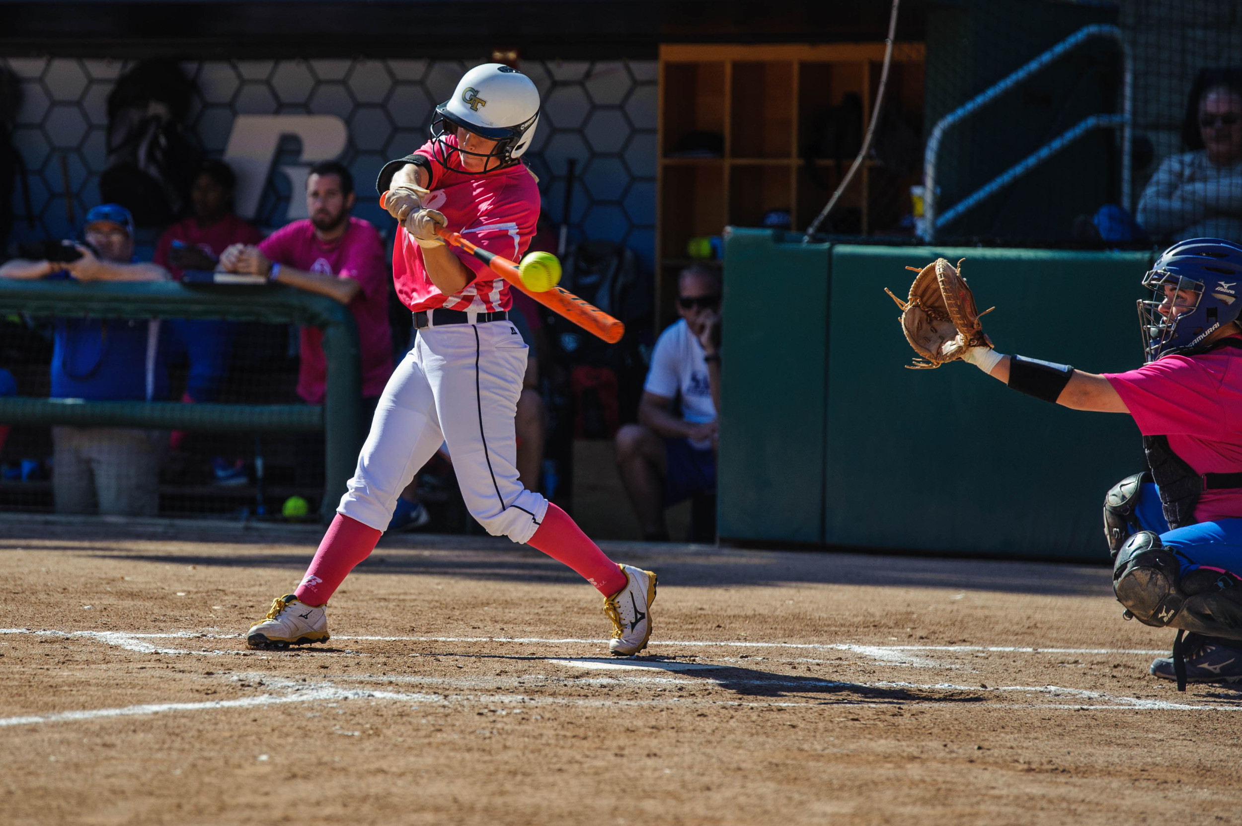 A Georgia Tech player hits the ball.