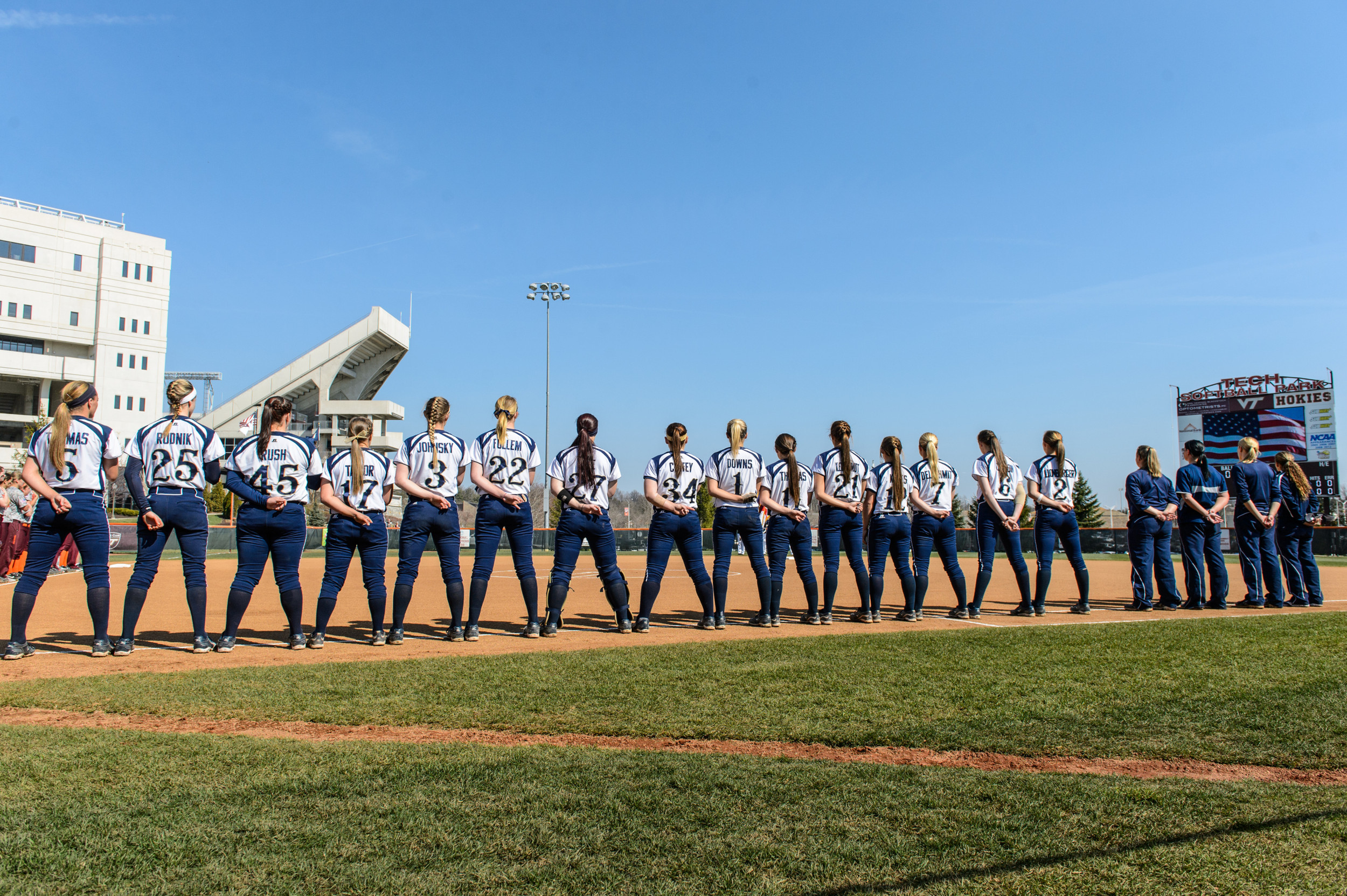 The team lines up for the National Anthem