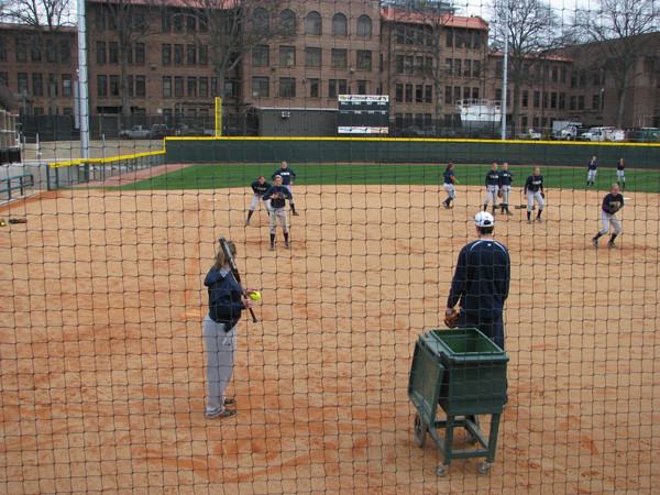 Softball team practices in its new stadium for the first time.