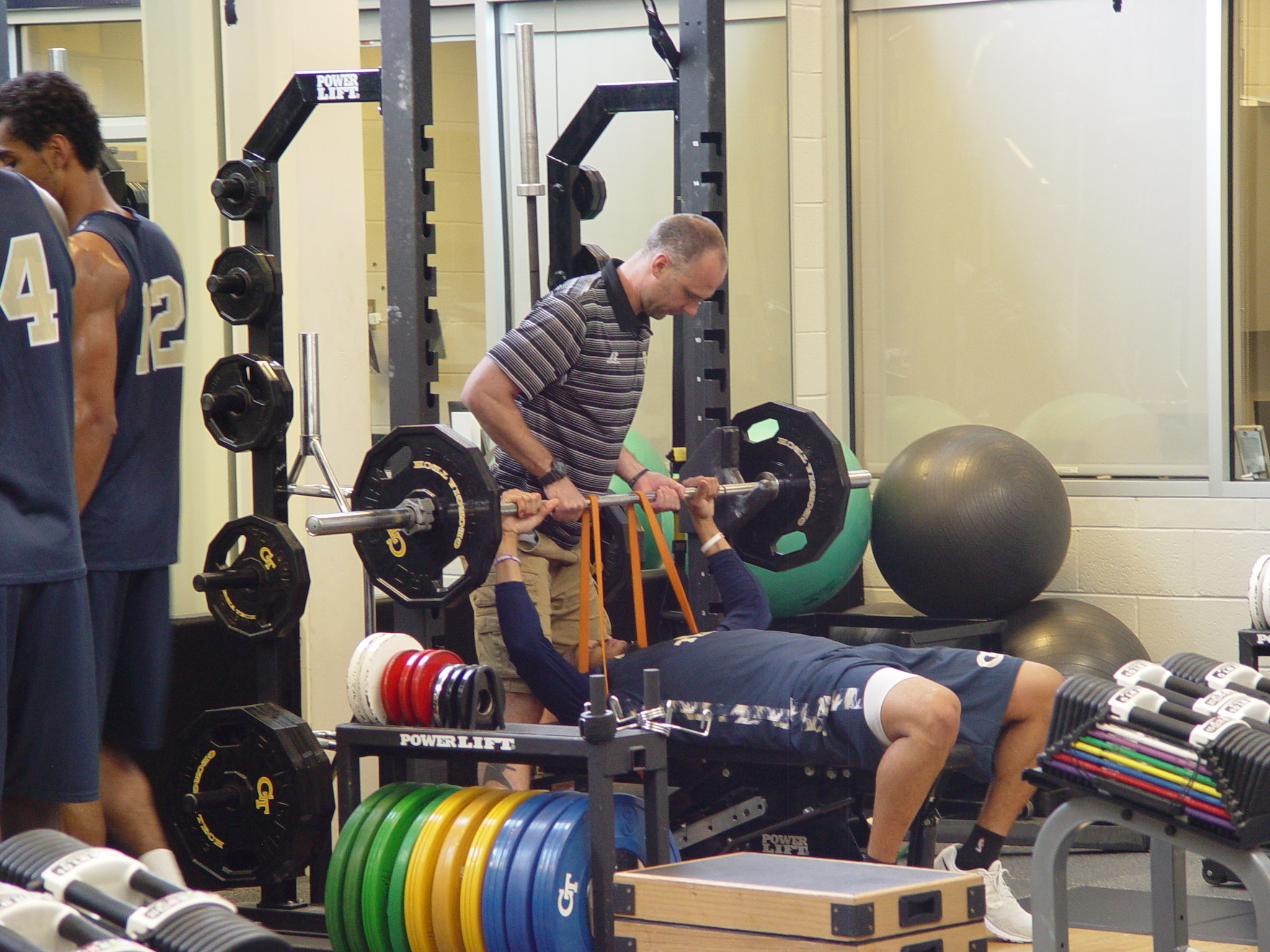 Player development coach Dan Taylor takes the Georgia Tech men's basketball team through a workout on June 16, 2016 in the Zelnak Center weight room.
