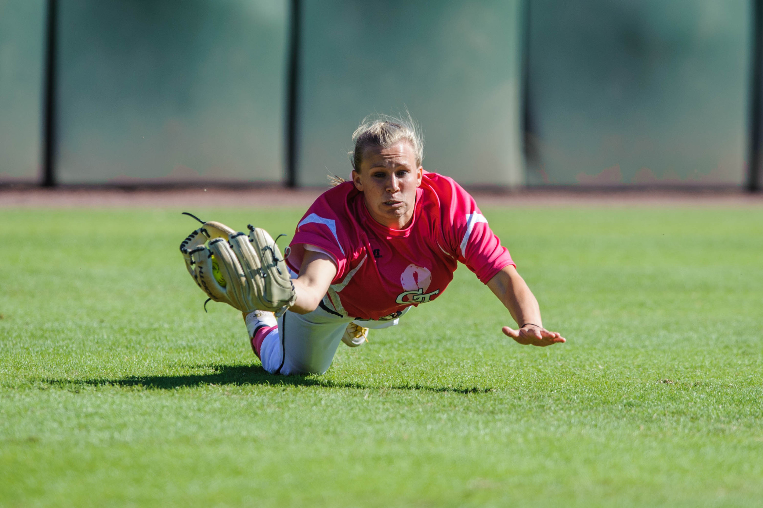 A Georgia Tech player makes a diving catch.