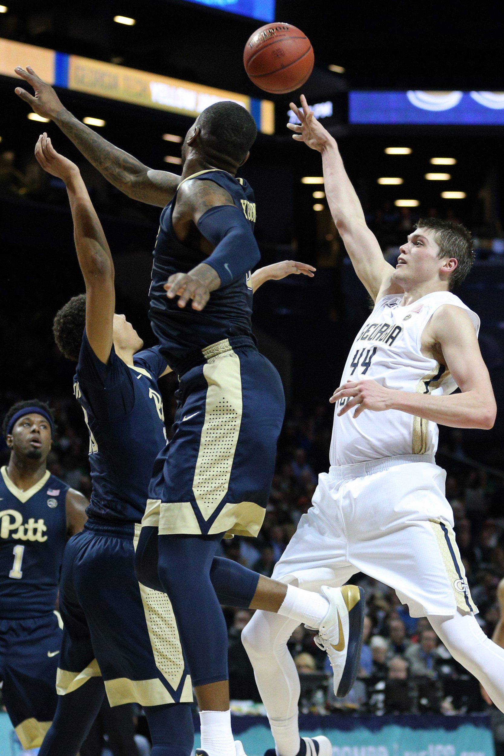 Center Ben Lammers shoots against Pittsburgh Panthers forward Michael Young and guard Cameron Johnson during the first half of an ACC Conference Tournament game at Barclays Center. Credit: Brad Penner-USA TODAY Sports