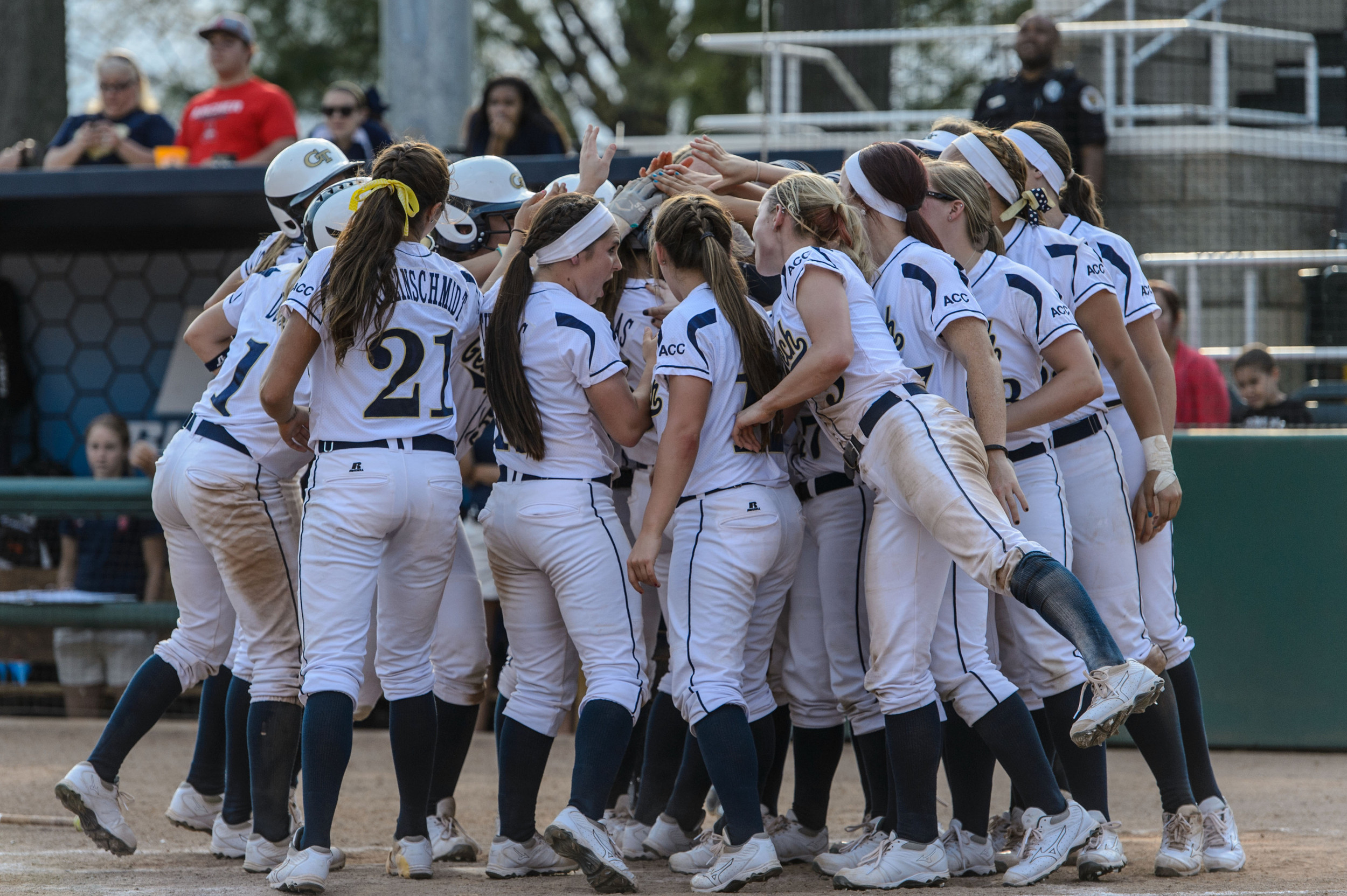 The team celebrates Ashley Thomas' (5) home run