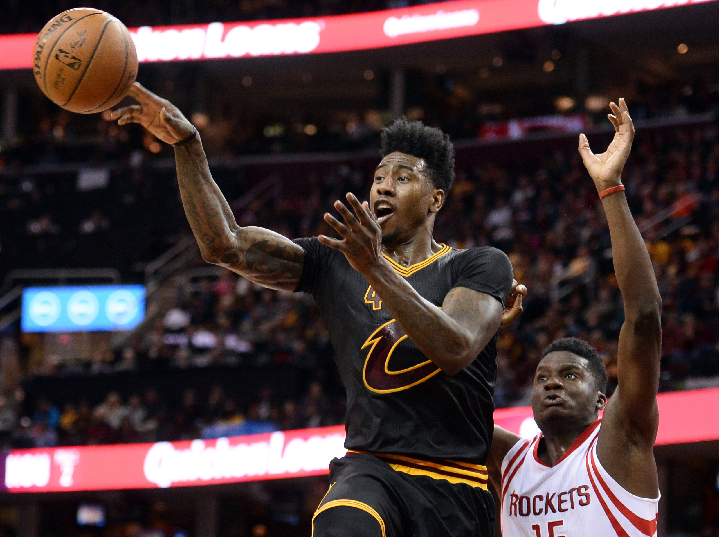 Mar 29, 2016; Cleveland, OH, USA; Cleveland Cavaliers guard Iman Shumpert (4) passes during a game against the Houston Rockets. Credit: Ken Blaze-USA TODAY Sports
