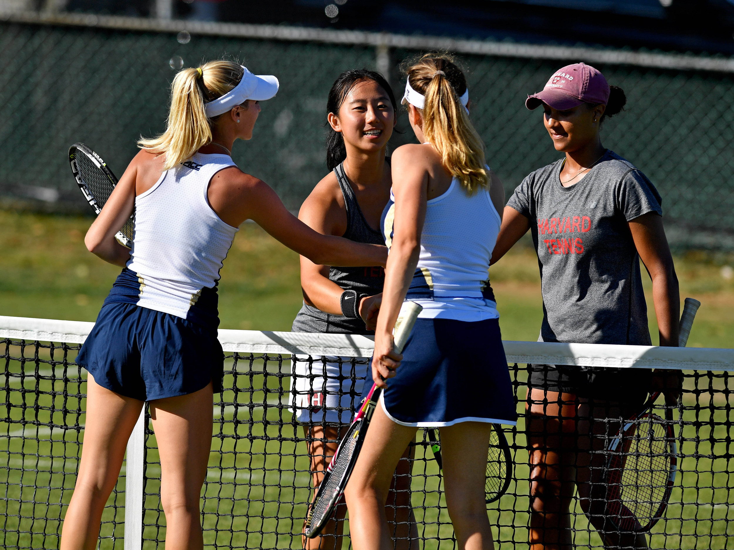 Georgia Tech's Nadia Gizdova and Alexa Anton-Ohlmeyer shake hands with opponents after a match at the Hall Fame Tennis Club. Credit: Brian Fluharty-USA TODAY Sports