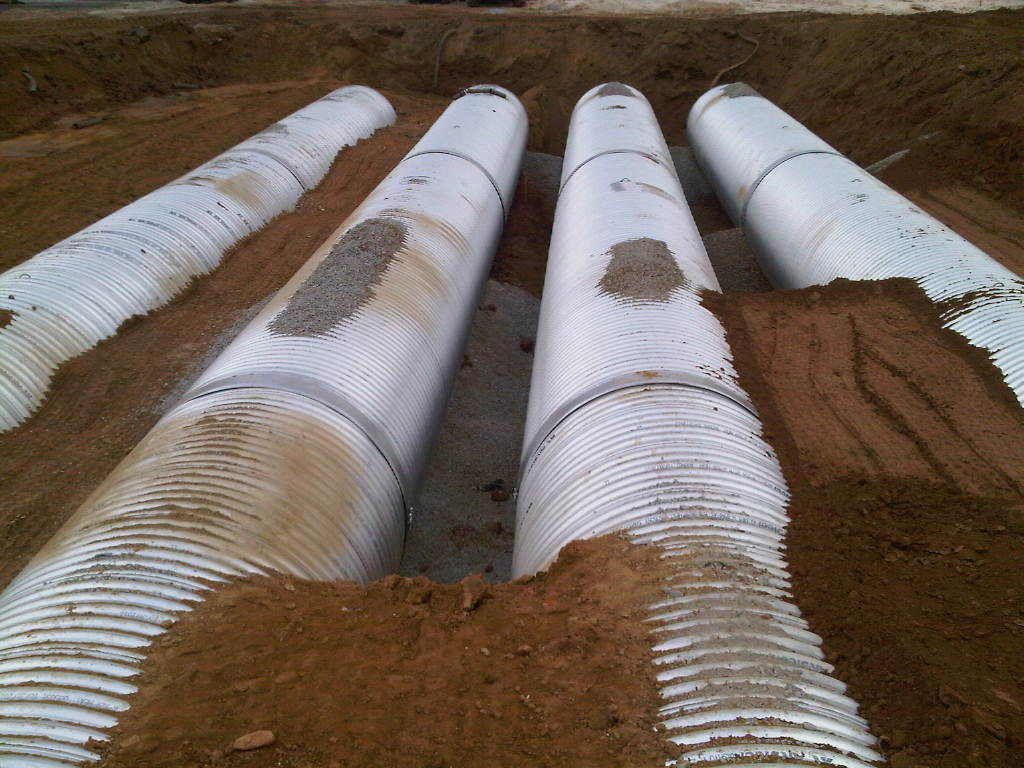 Photo taken on March 21, 2011 - Pipes going in under fields to hold excess water