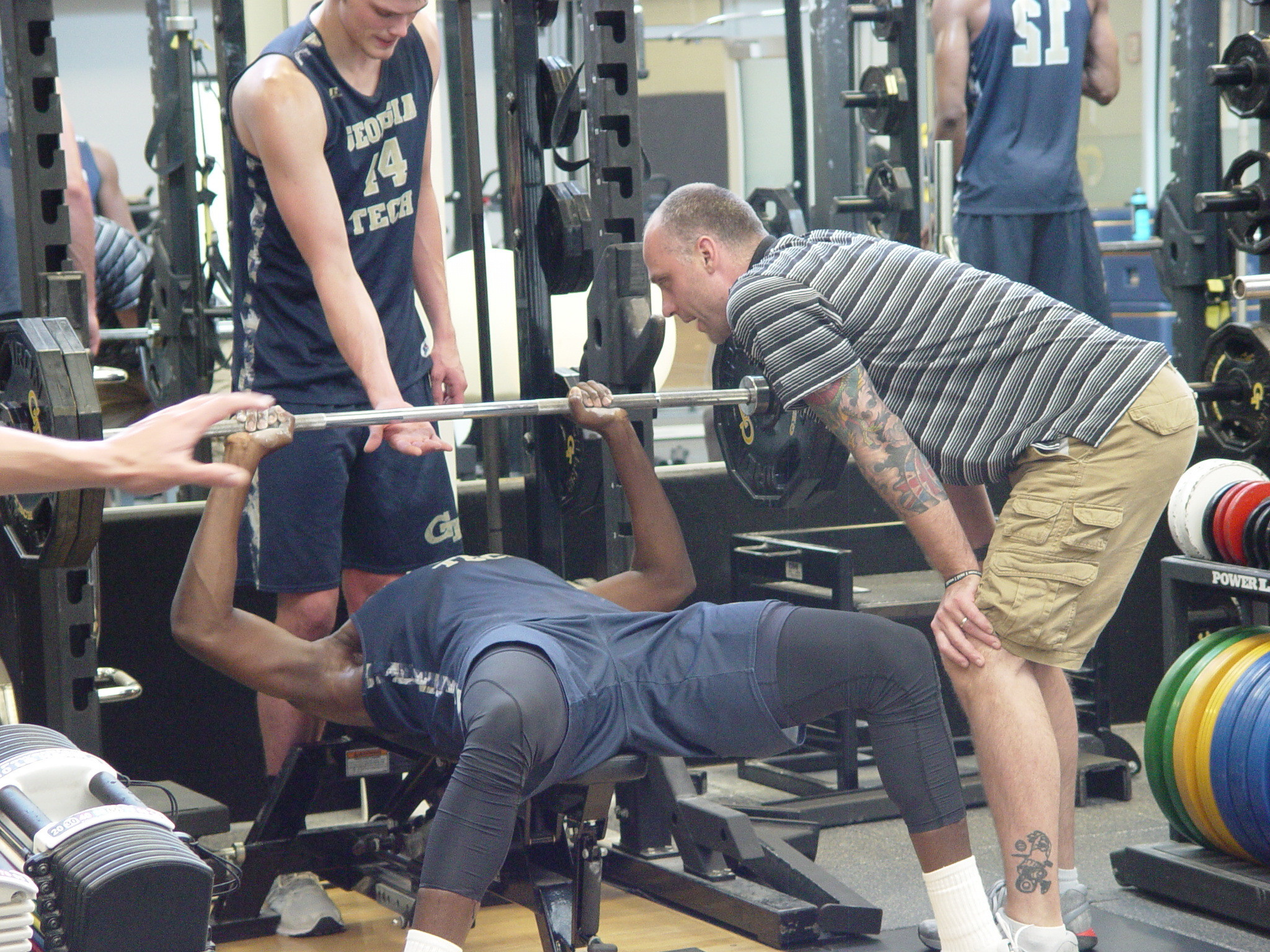 Player development coach Dan Taylor takes the Georgia Tech men's basketball team through a workout on June 16, 2016 in the Zelnak Center weight room.