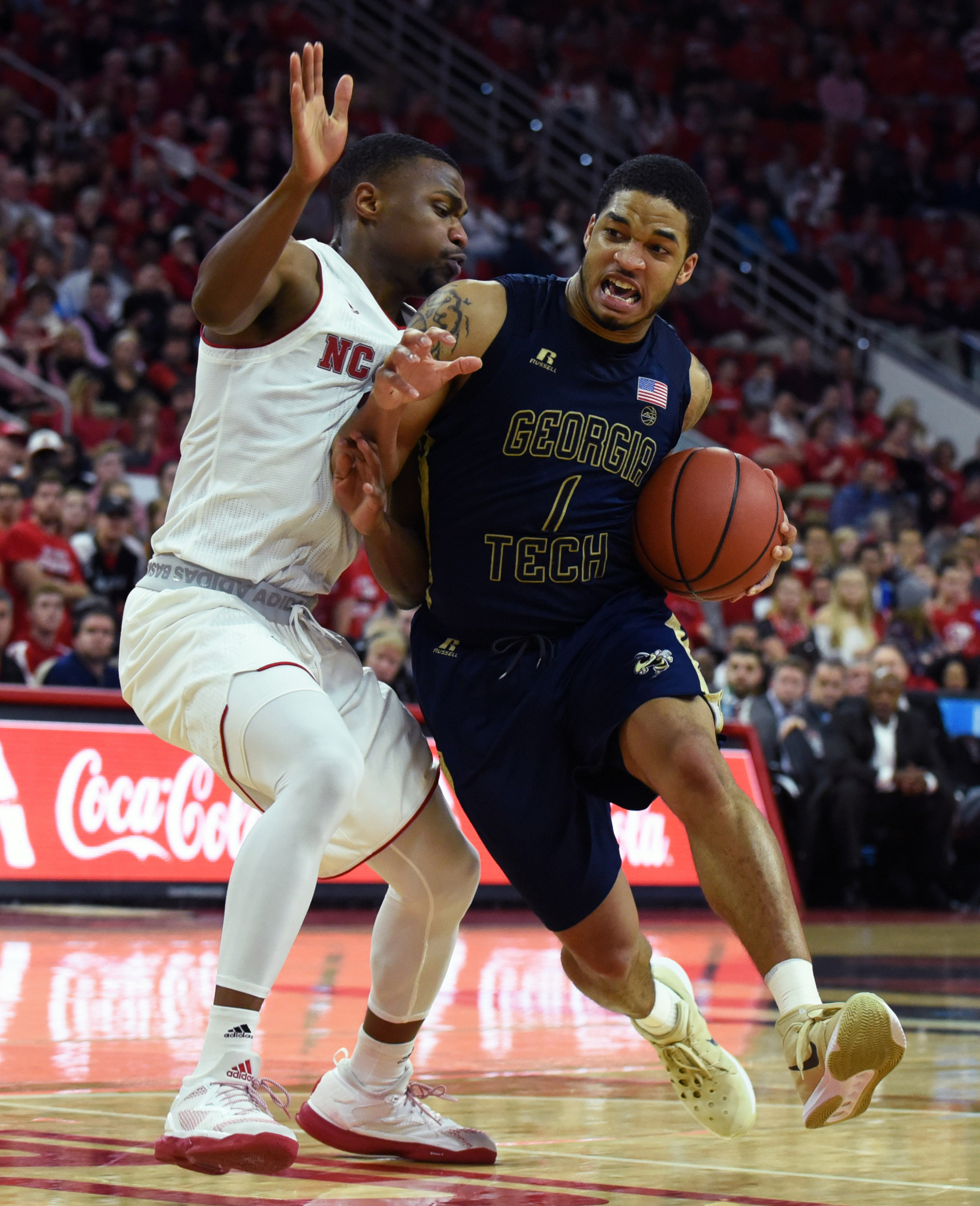 Guard Tadric Jackson drives to the basket as North Carolina State Wolfpack guard Torin Dorn defends during the second half. The Yellow Jackets won 86-76. Credit: Rob Kinnan-USA TODAY Sports